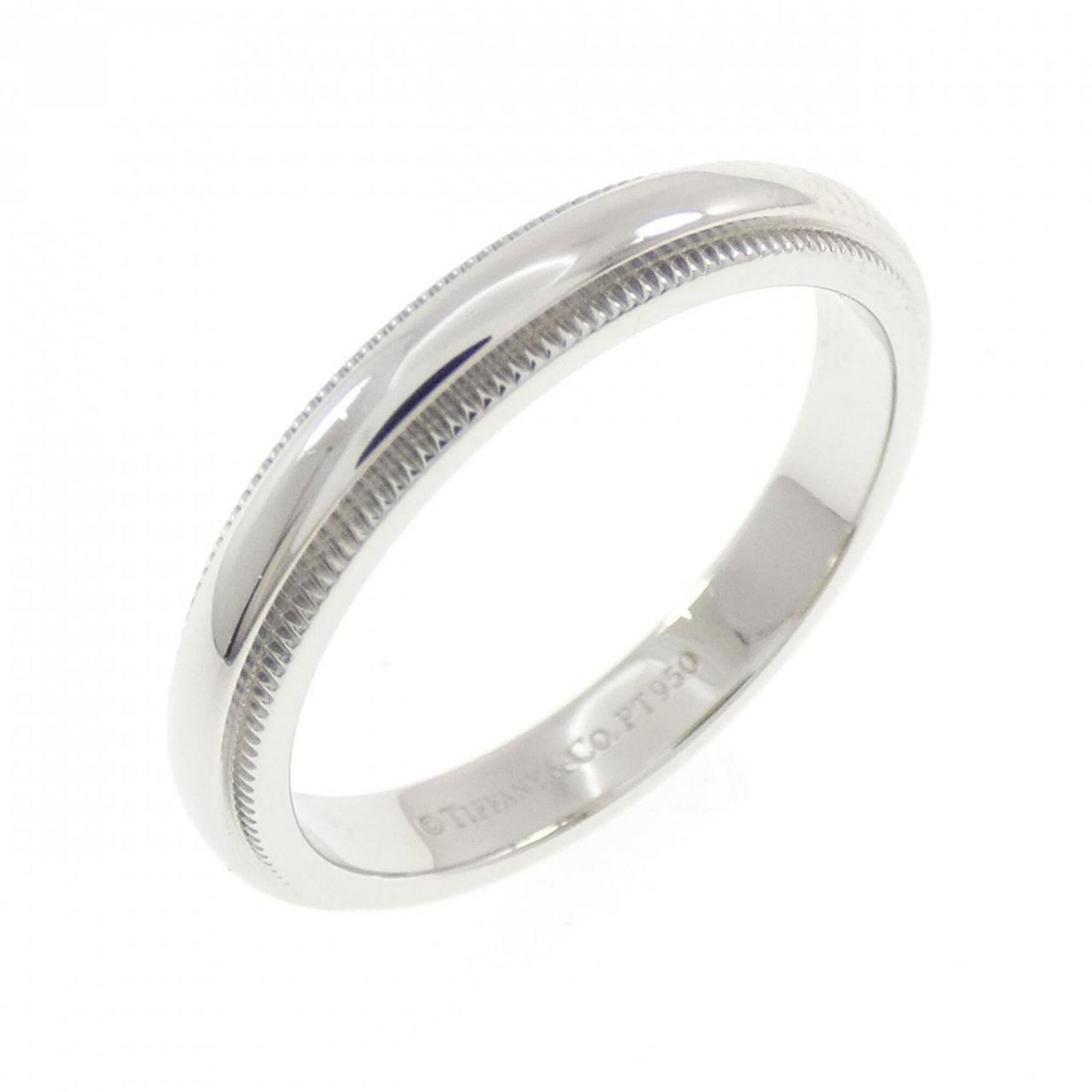 Platinum ring by Tiffany band: Platinum ring by Tiffany band Platinum ring by Tiffany features a band design made from high-quality platinum, with a US size 6.5 to fit comfortably on the finger. The ring has been used and shows som