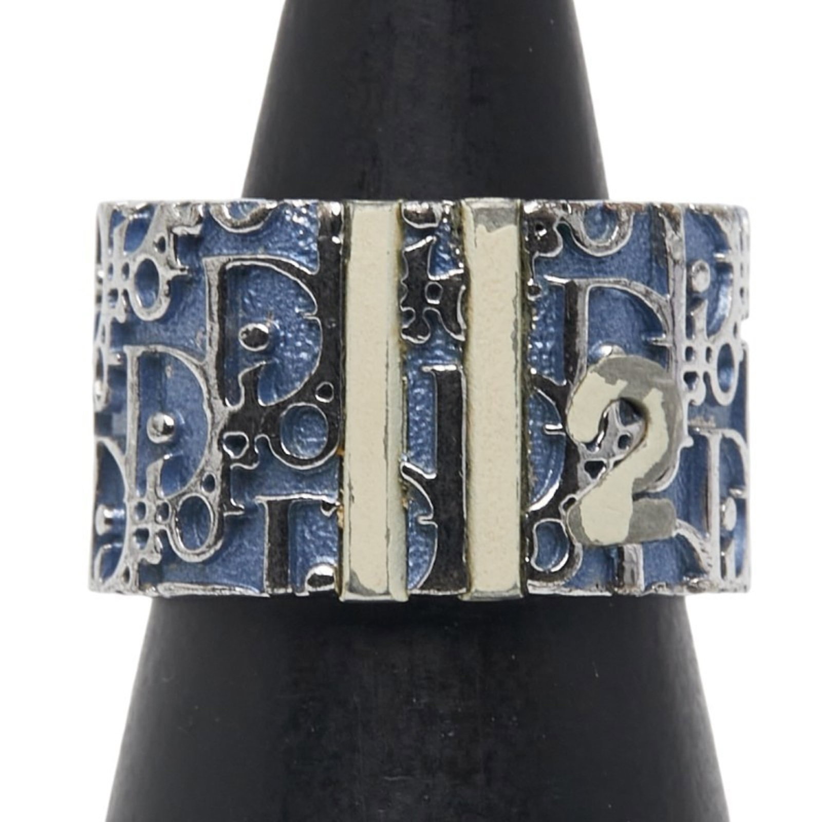 Dior Metal Ring Christian Band: Dior Metal Ring Christian Band The Dior Metal Ring Christian Band boasts a striking blue hue and sleek silver finish, showcasing the brand's signature style. This used band ring features minor