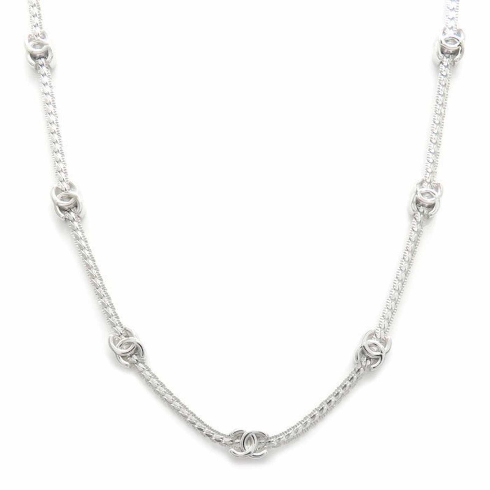 Women's A25V Mark Necklace Plated Coco Chanel: Women's A25V Mark Necklace Plated Coco Chanel The A25V Mark Necklace in gold plating features the iconic Coco Chanel design, adding a touch of timeless elegance to any outfit. With its silver-toned