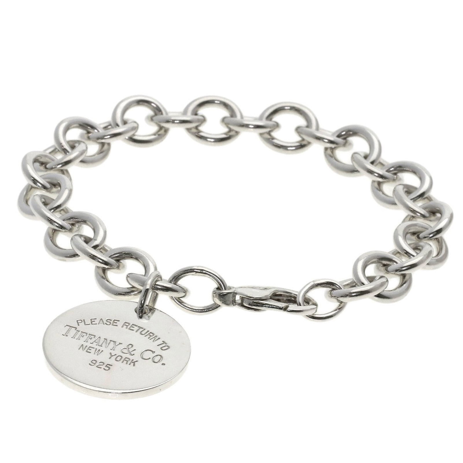 Charm bracelet silver of Tiffany: Charm bracelet silver of Tiffany Silver Tiffany charm bracelet with a length of 17cm, bearing little signs of use. This like-new condition piece showcases the brand's signature style, making it a grea