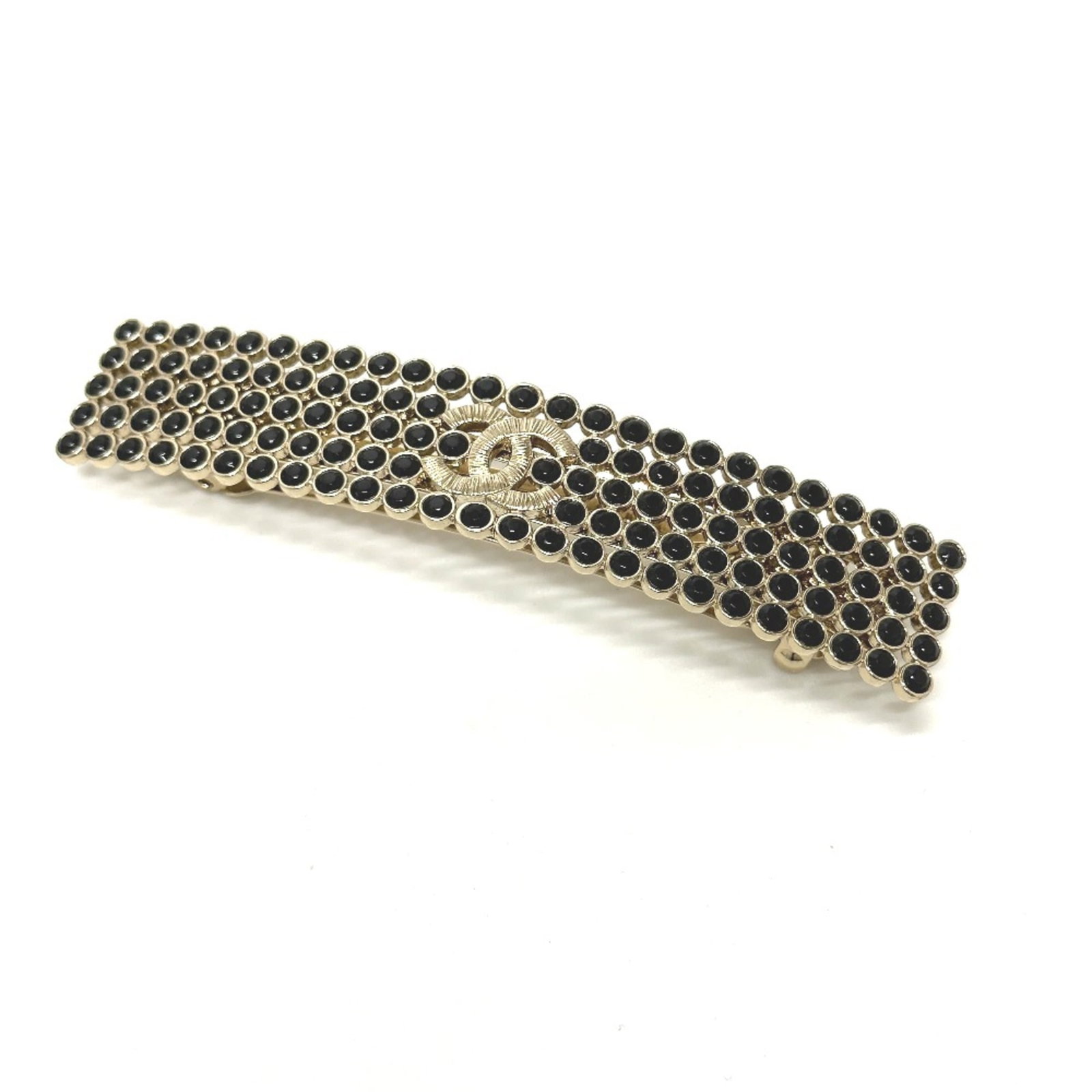 Chanel gold other plated: Chanel gold other plated Gold plated Chanel accessory in black, measuring 4.3 inches in length and featuring a total width of 2cm/0.8inch, with a worn condition that shows hardly any signs of usage. T