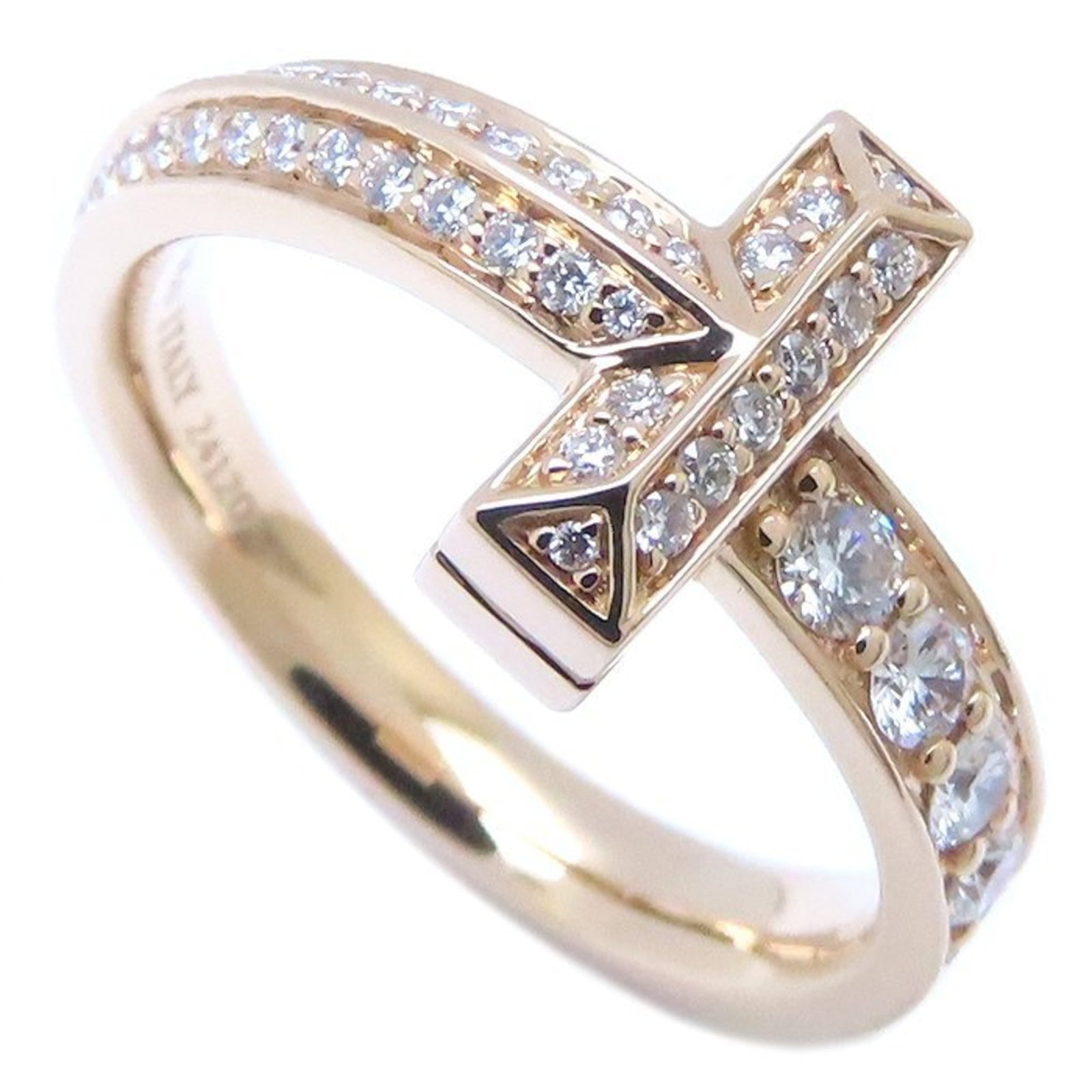 Tiffany Band Ring Rose Gold (18K): Tiffany Band Ring Rose Gold (18K) Tiffany Band Ring Rose Gold (18K) - A beautiful rose gold band ring featuring a diamond stone, weighing 0.45 carats in US size 6.5. The ring bears some minor
