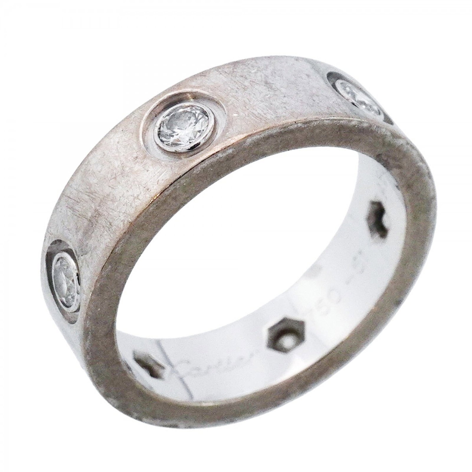 White Gold Cartier Band Ring 18K: White Gold Cartier Band Ring 18K White Gold Cartier Band Ring 18K features a classic design with a diamond stone, set in 18k white gold. The ring has been well-cared for and shows signs of gentle