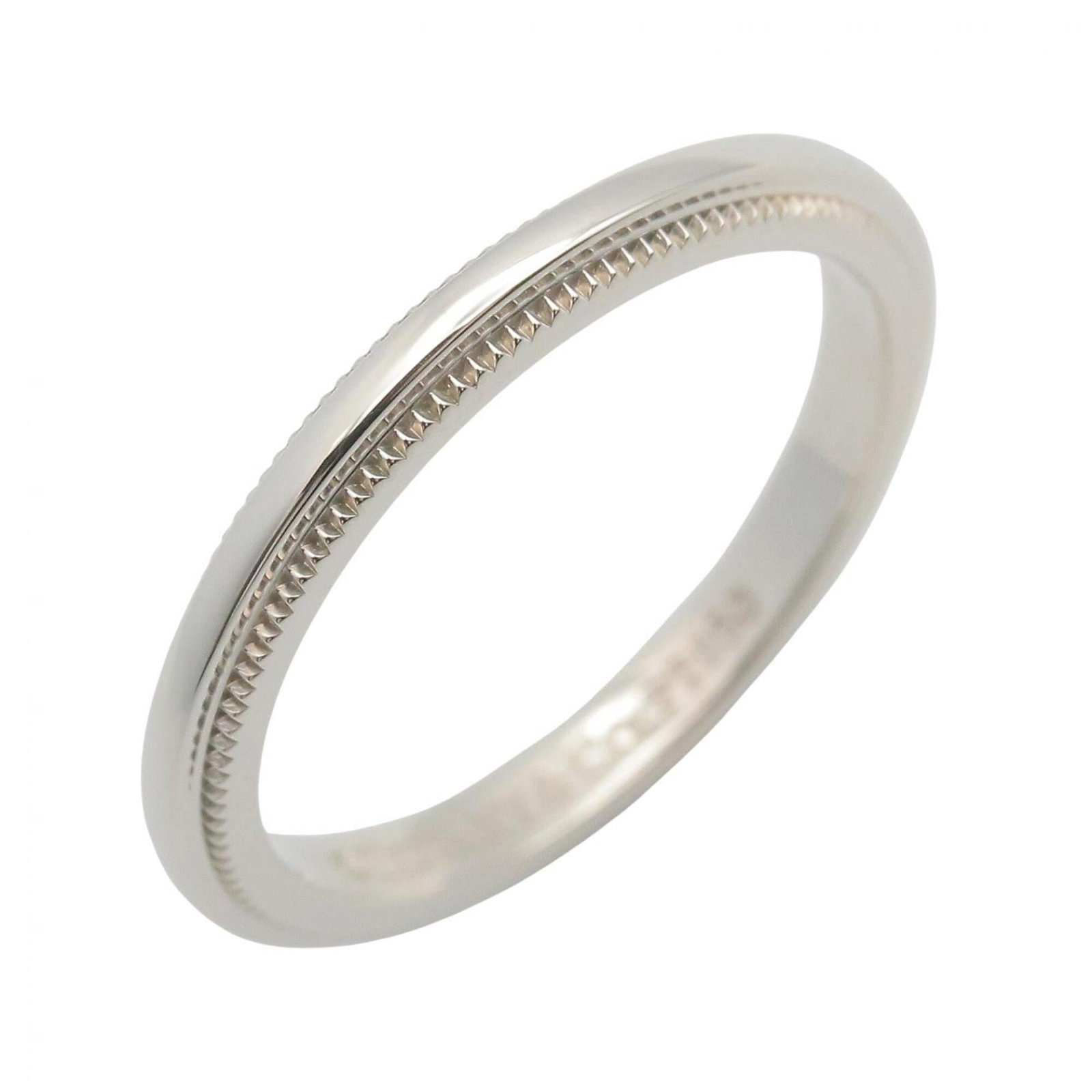 Platinum ring by Tiffany band: Platinum ring by Tiffany band Platinum ring by Tiffany features a sleek band design, crafted from high-quality platinum material. The silver tone adds a touch of sophistication to this elegant piece, 