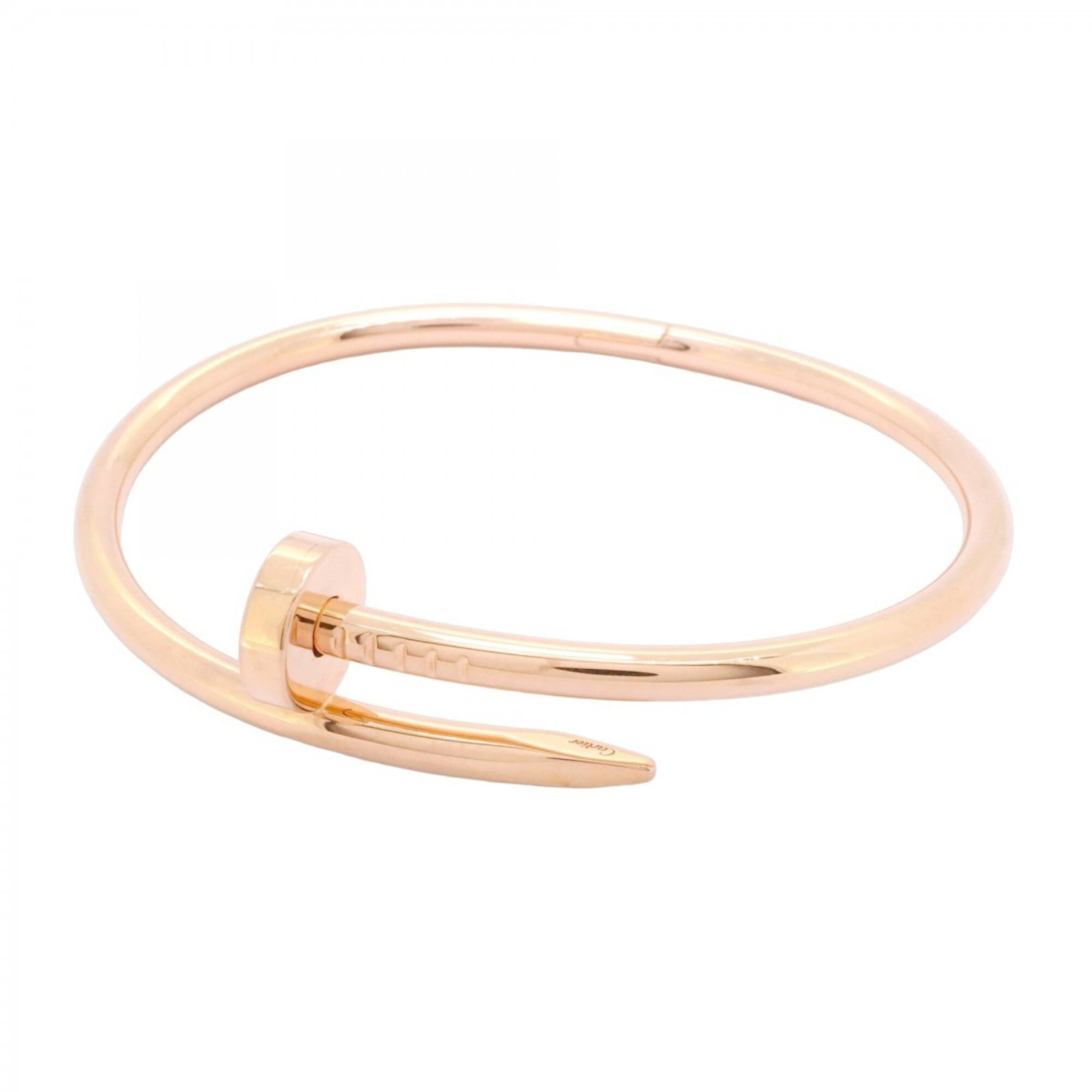Pink Gold 18K Bangle Cartier: Pink Gold 18K Bangle Cartier Pink Gold 18K Bangle Cartier, a statement piece featuring the iconic brand's signature style. This 16.5cm bangle boasts a beautiful pink gold finish and bears a signature,