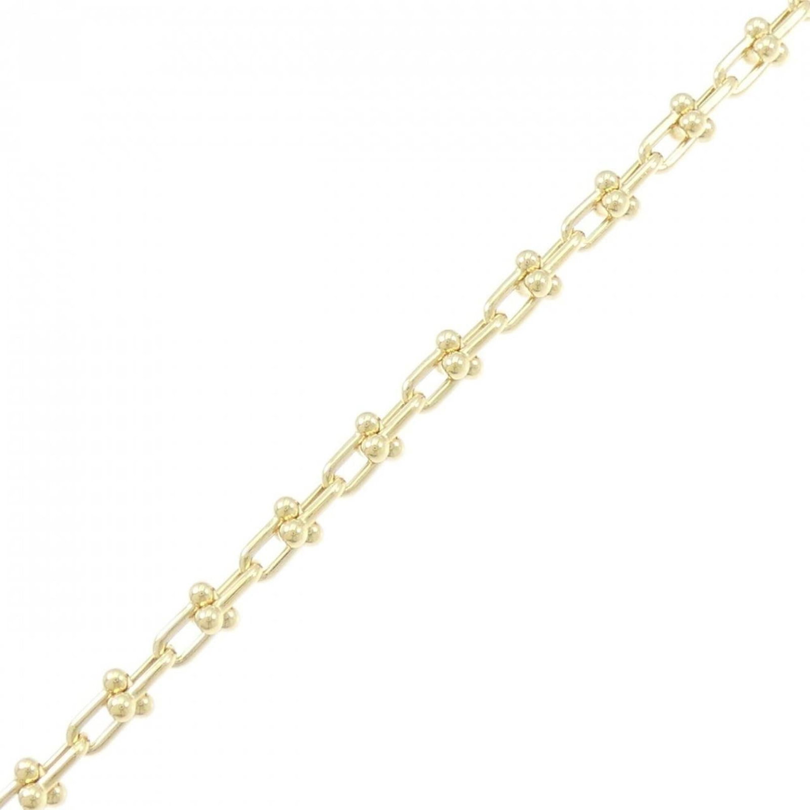 Tiffany Charm Bracelet Yellow Gold (18K): Tiffany Charm Bracelet Yellow Gold (18K) Yellow gold (18K) charm bracelet from Tiffany, featuring a delicate design with subtle scratches and minor dirt marks. The total length is 17cm / 6.69'', makin