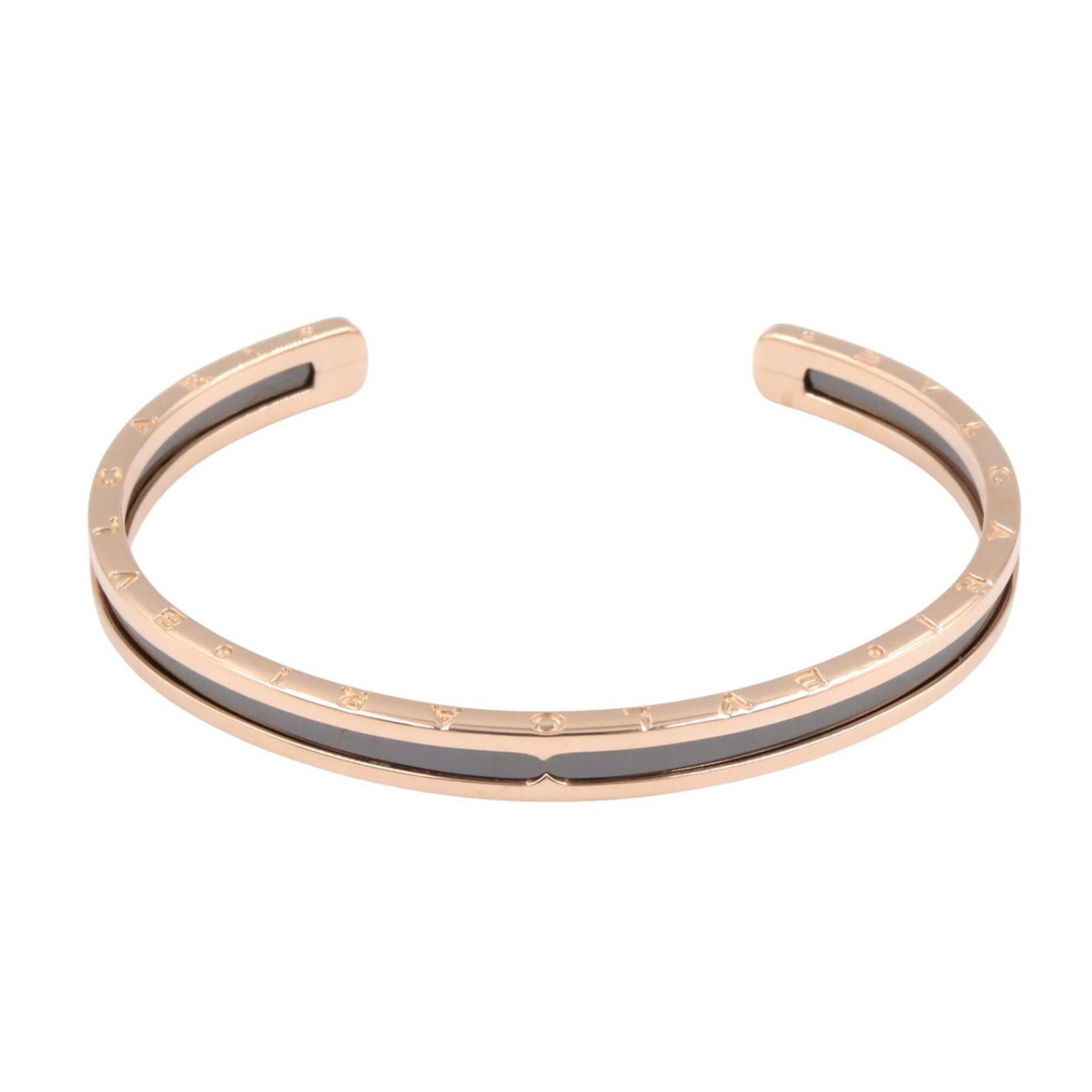 Pink Gold Bvlgari Charm Bracelet 18K: Pink Gold Bvlgari Charm Bracelet 18K Pink Gold Bvlgari Charm Bracelet 18K features an elegant pink gold chain with a subtle black hue, making it a sophisticated accessory for women. This 15.5cm long