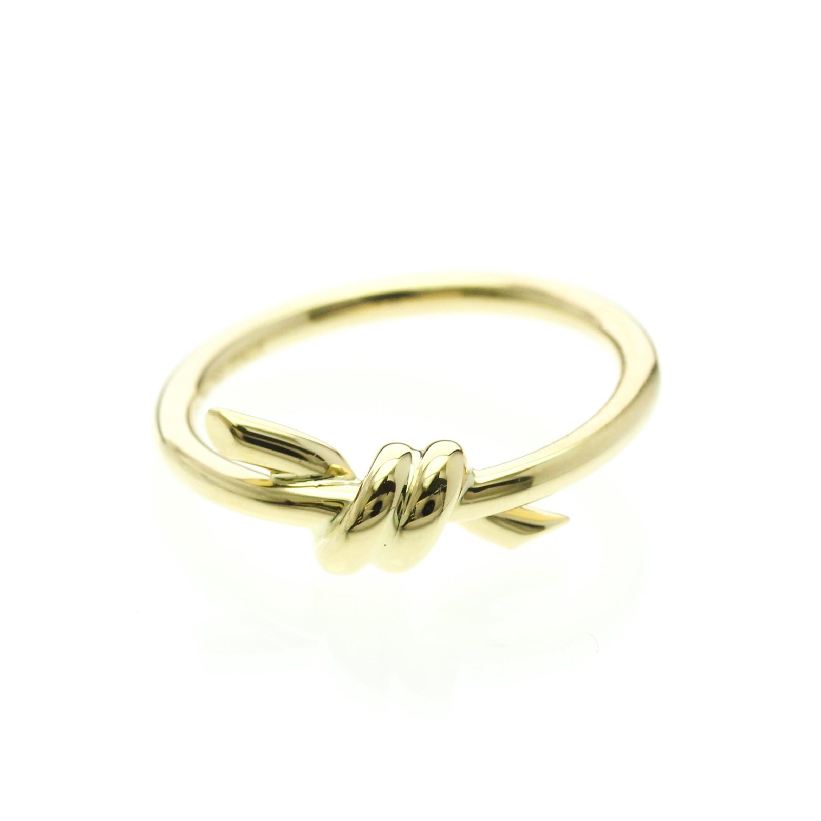 Tiffany Ring Gold Yellow 18K: Tiffany Ring Gold Yellow 18K Tiffany Ring Gold Yellow 18K - A timeless fashion statement, this 18k yellow gold band ring boasts a sleek design with a subtle width of 1.8mm. With its sturdy weight and