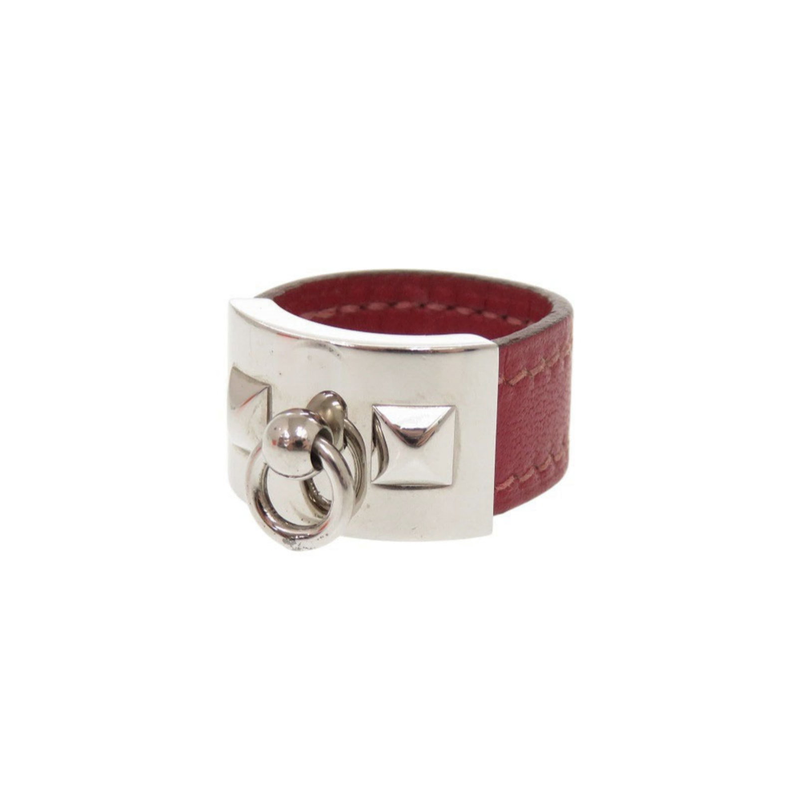 Metal leather ring band Hermes: Metal leather ring band Hermes This Herm?s metal leather ring band is a striking red color with silver accents, featuring high-quality leather and metal construction. The band bears a few traces of