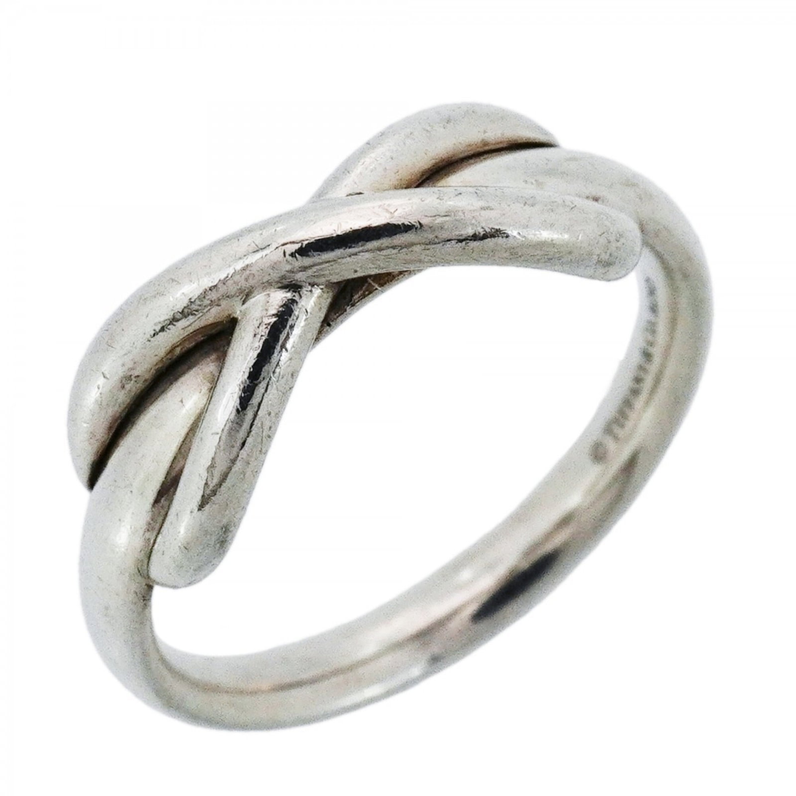 Tiffany Band Ring Silver 925: Tiffany Band Ring Silver 925 Silver 925 Tiffany band ring with a classic design, bearing a signature. The ring features a subtle sheen and a comfortable fit, suitable for everyday wear. Traces of usag