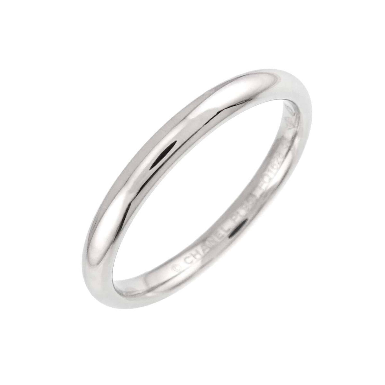 Chanel Band Ring Platinum 950: Chanel Band Ring Platinum 950 Platinum 950 construction and sleek design make this Chanel band ring a sophisticated accessory. Bearing the iconic brand's signature, this piece boasts a refined look