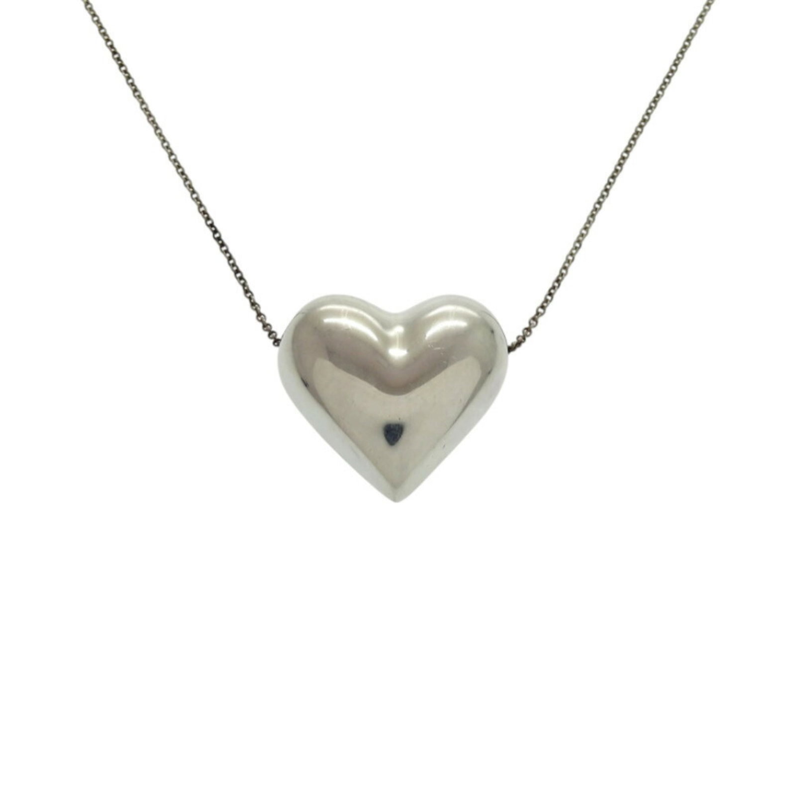 Tiffany Pinched Heart Sterling Silver Necklace 1858 Tiffany & Co.: Tiffany Pinched Heart Sterling Silver Necklace 1858 Tiffany & Co. Sterling silver necklace from iconic Tiffany & Co., featuring a pinched heart pendant. The piece boasts an elegant design and