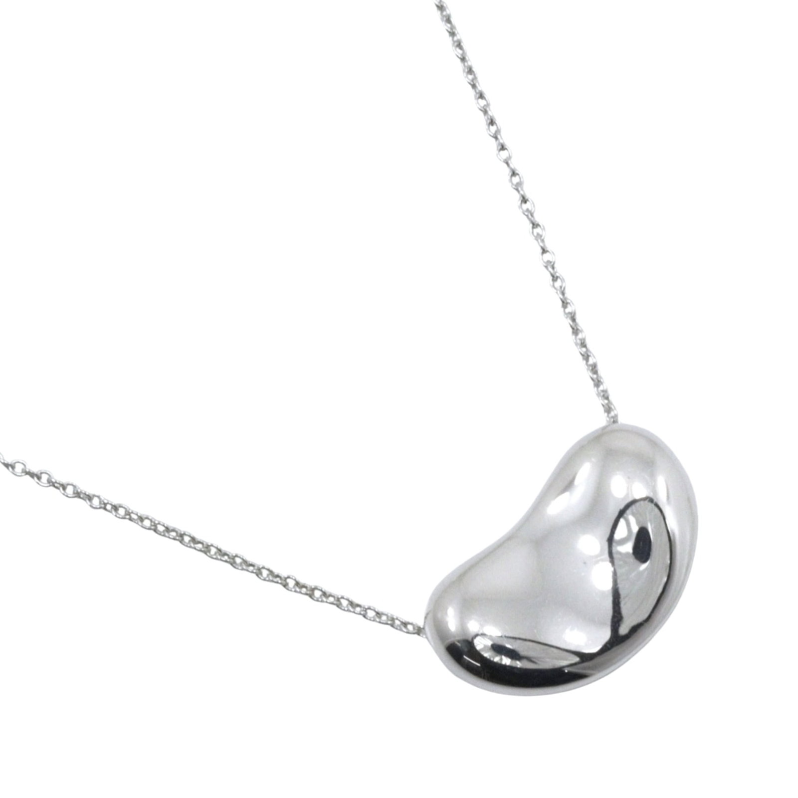 Tiffany & Co. Bean Necklace Elsa Peretti Design Sterling Silver 925 Approx. 7G Women'S.: Tiffany & Co. Bean Necklace Elsa Peretti Design Sterling Silver 925 Approx. 7G Women'S. Sterling silver Tiffany & Co. Bean Necklace by Elsa Peretti features a sleek design with intricate details,