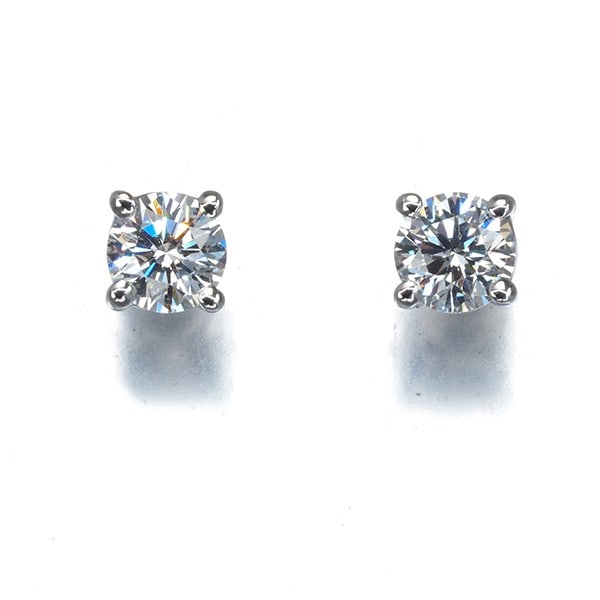 Solitaire earrings diamond 0.23ct platinum 950 by Tiffany & Co: Solitaire earrings diamond 0.23ct platinum 950 by Tiffany & Co Solitaire earrings featuring a 0.23ct diamond set in platinum, crafted by Tiffany & Co. with a metal purity of 950. The natural diamond i