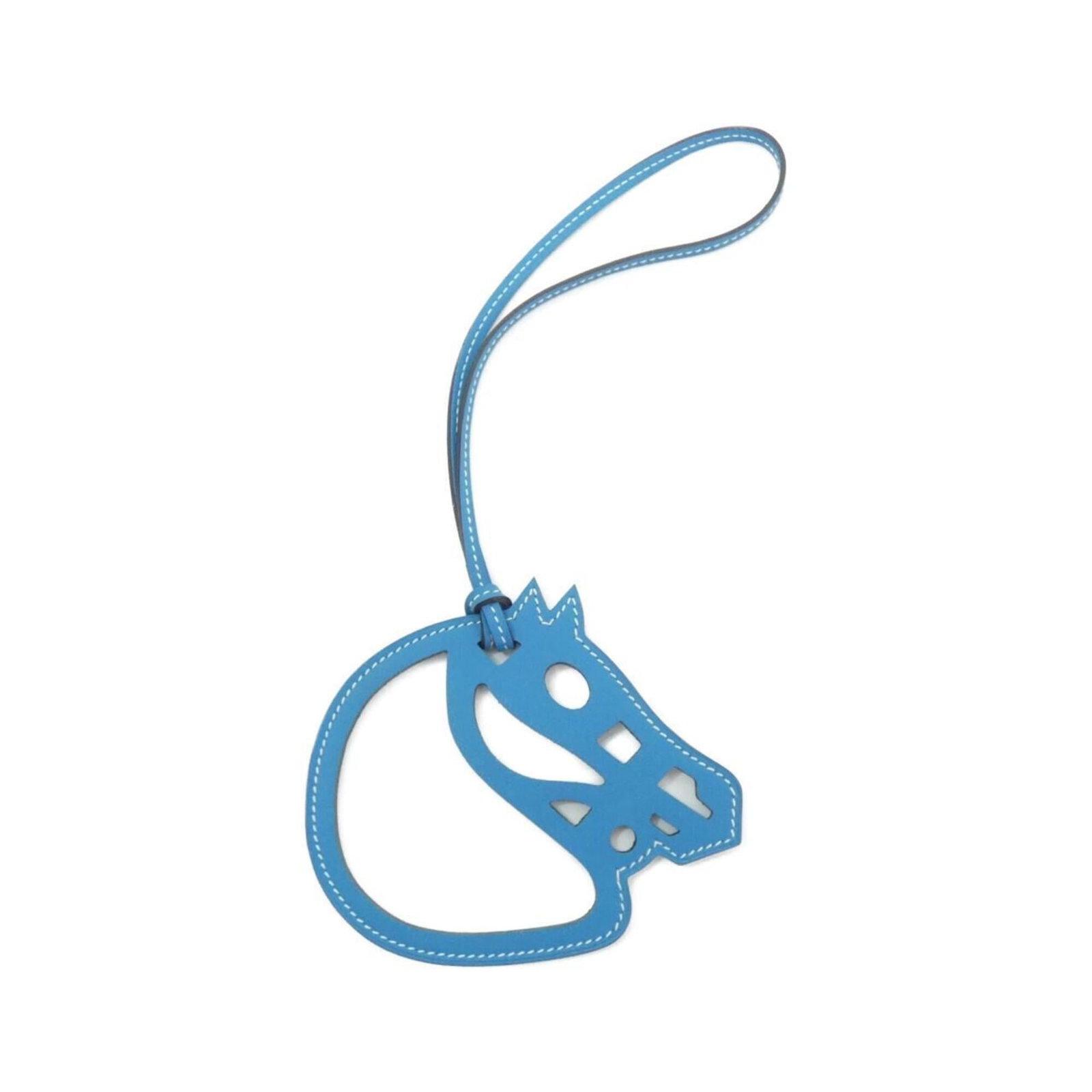 Swift leather handbag charm Hermes: Swift leather handbag charm Hermes Swift leather handbag charm from Hermes, featuring blue color and a chain length of 15.35 inches, adds a touch of elegance to any accessory. The charm bears some