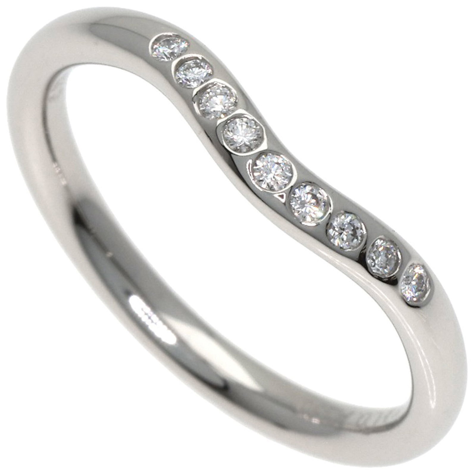 Platinum ring by Tiffany band: Platinum ring by Tiffany band Platinum ring by Tiffany features a diamond stone set in a band ring. The item has some scratches and dirt, but overall remains in very good condition with only a few tra