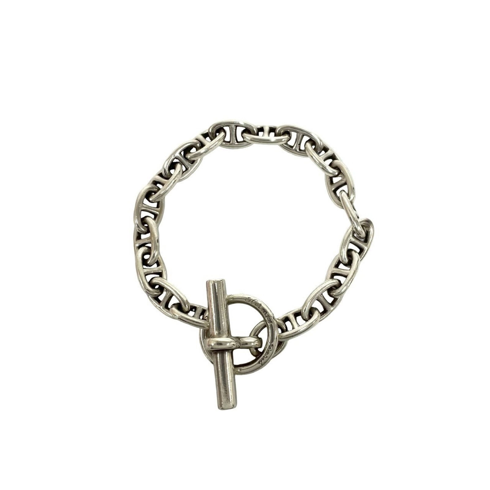 Silver Charm Bracelet 925 by Hermes: Silver Charm Bracelet 925 by Hermes Silver Charm Bracelet 925 by Hermes - A delicate, sterling silver charm bracelet with a subtle sheen, measuring 20cm in length. The bracelet bears signs of previous