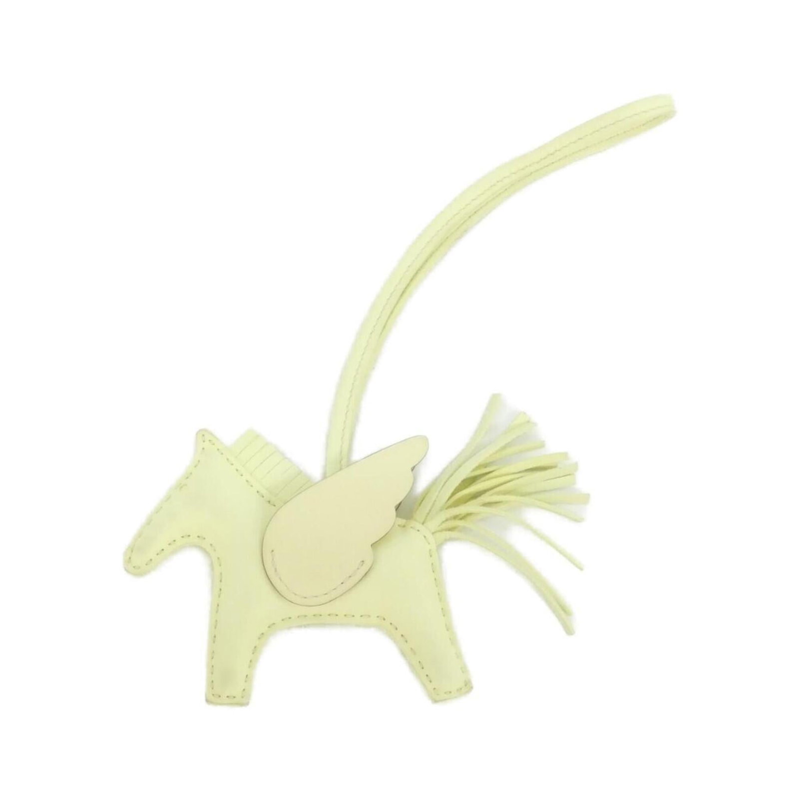 Hermes Handbag Charm Agneau Milo: Hermes Handbag Charm Agneau Milo Agneau Milo, a luxurious material known for its softness and durability, is used to create the Agneau Milo Handbag Charm by Hermes. This charm features a striking