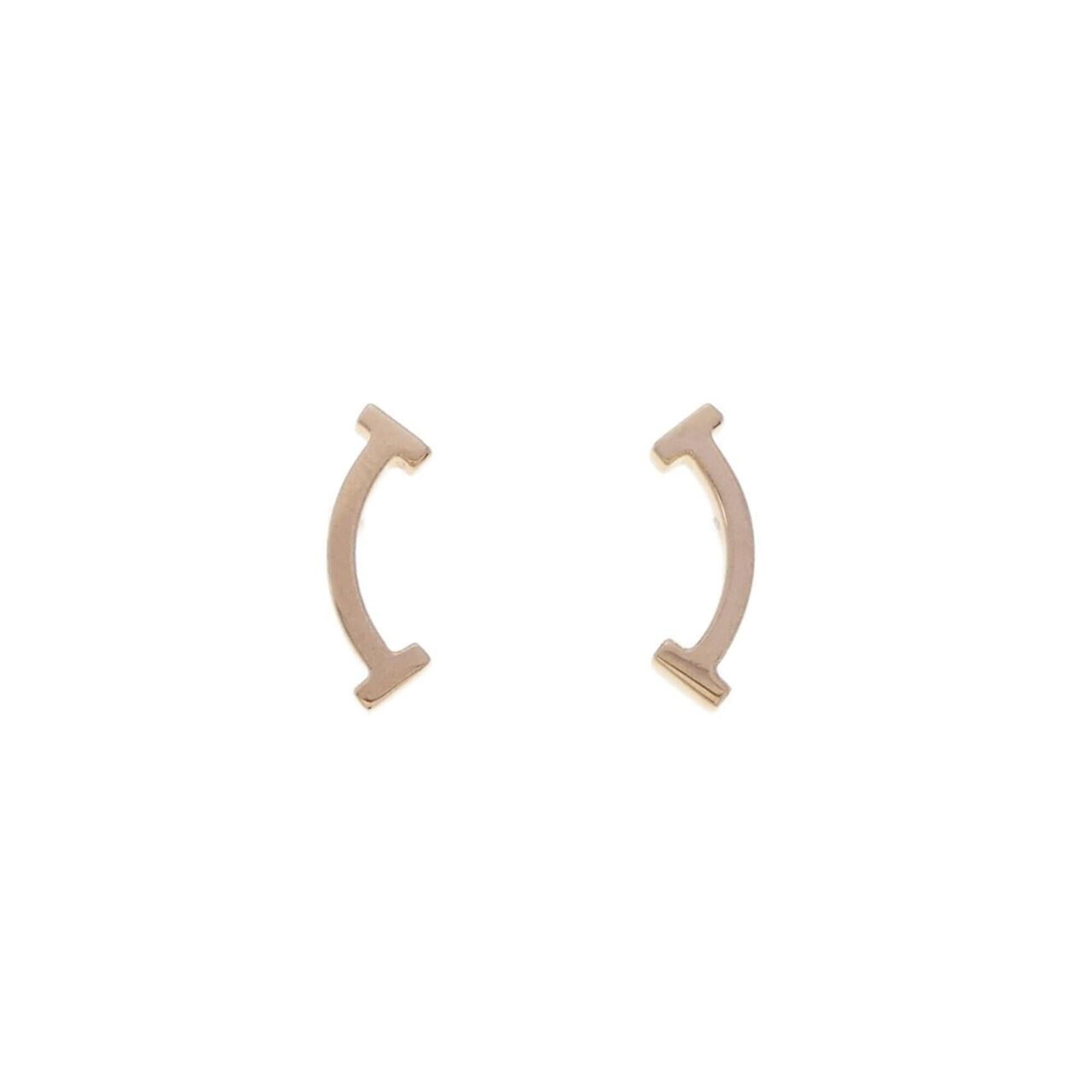 Gold Pink Tiffany Stud Earrings: Gold Pink Tiffany Stud Earrings Pink gold (18K) stud earrings with a subtle gold hue, adding a touch of elegance to any outfit. The earrings bear a signature and are made from durable pink gold materi