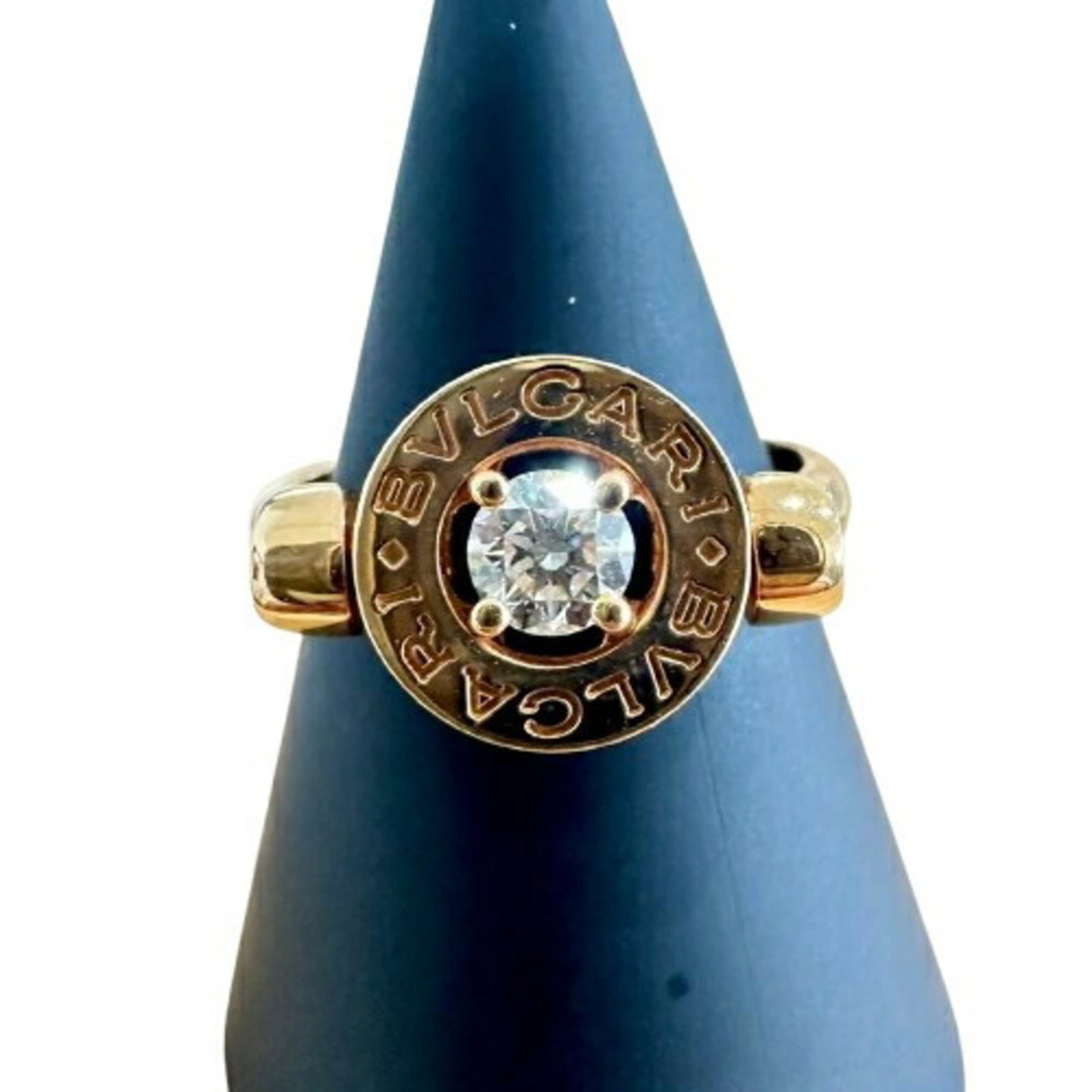 Pink Gold 18K Bvlgari Band Ring: Pink Gold 18K Bvlgari Band Ring Pink Gold 18K Bvlgari Band Ring - A stunning piece featuring pink gold (18K) and adorned with a diamond, this band ring showcases the luxury of Italian design. The