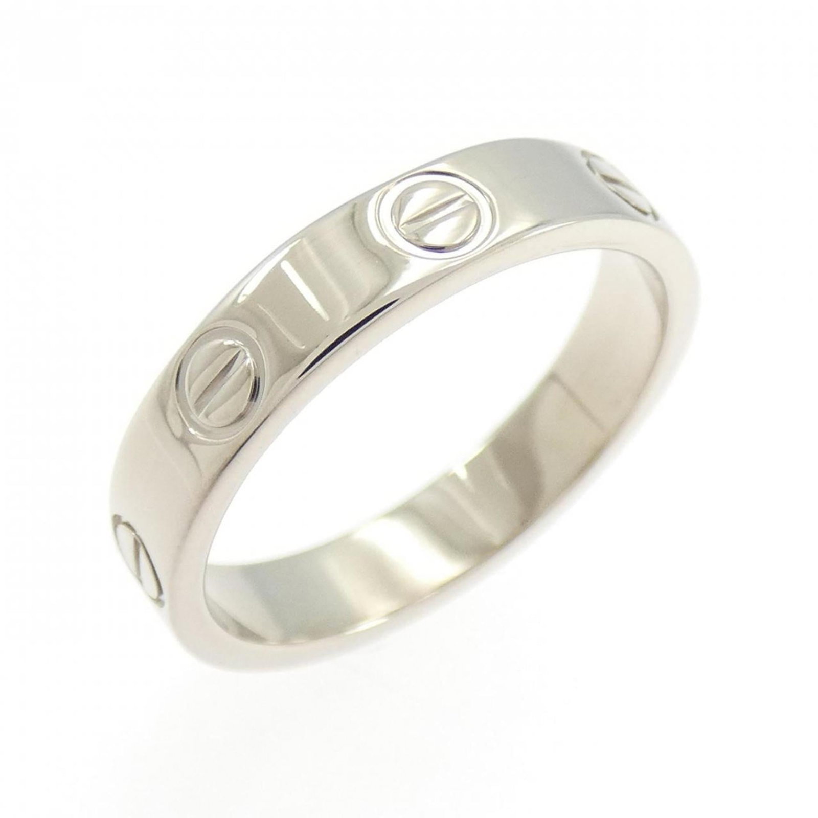 White Gold Cartier Band Ring 18K: White Gold Cartier Band Ring 18K White Gold Cartier Band Ring 18K. This 50mm band ring features 18k white gold, bearing some traces of usage and minor scratches/dirt. In very good condition, it