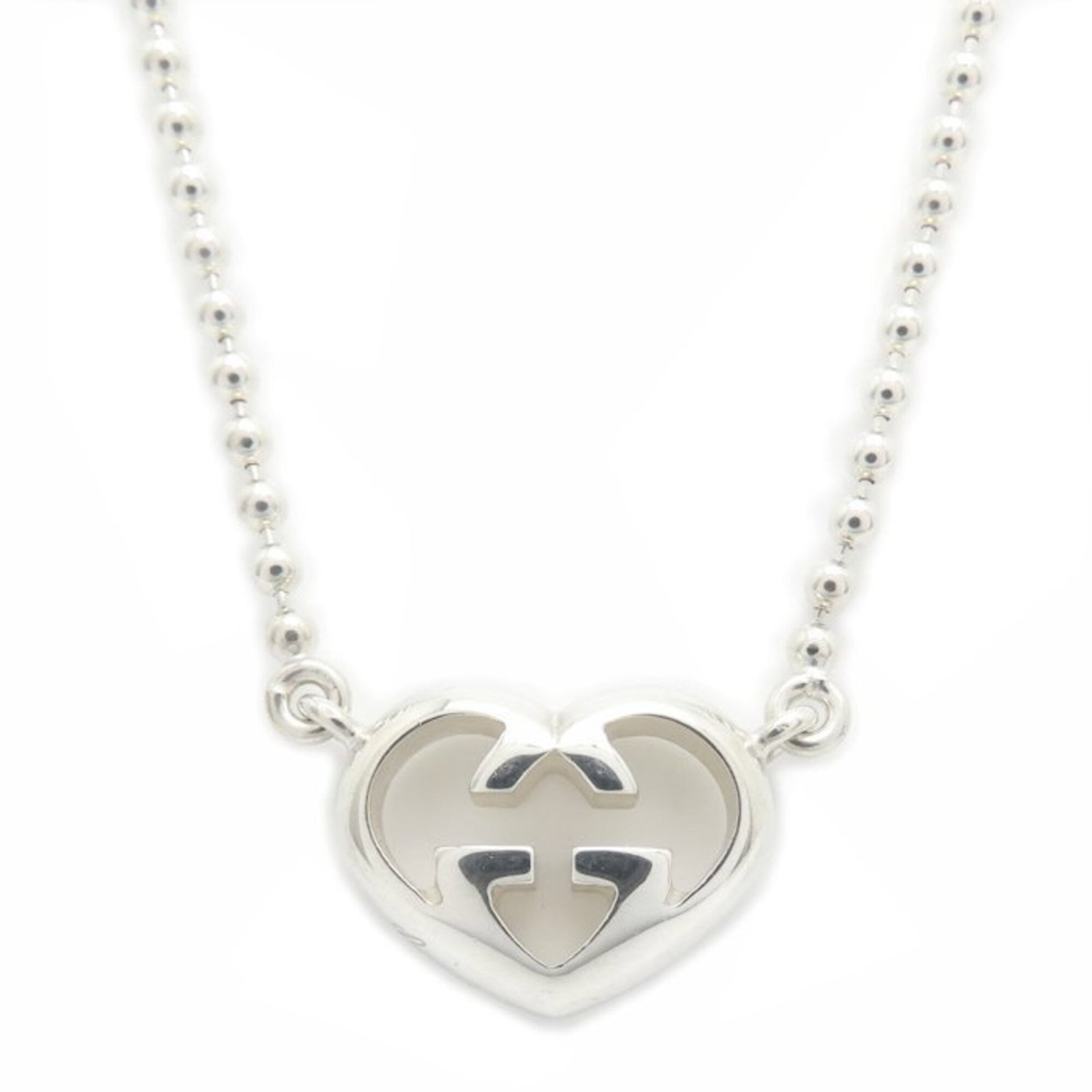 Gucci Rocking Heart G Necklace Sv925 Women's: Gucci Rocking Heart G Necklace Sv925 Women's Gucci Rocking Heart G Necklace in Silver 925 - A stylish and elegant accessory for women, featuring the iconic Gucci logo. This necklace boasts a sleek des