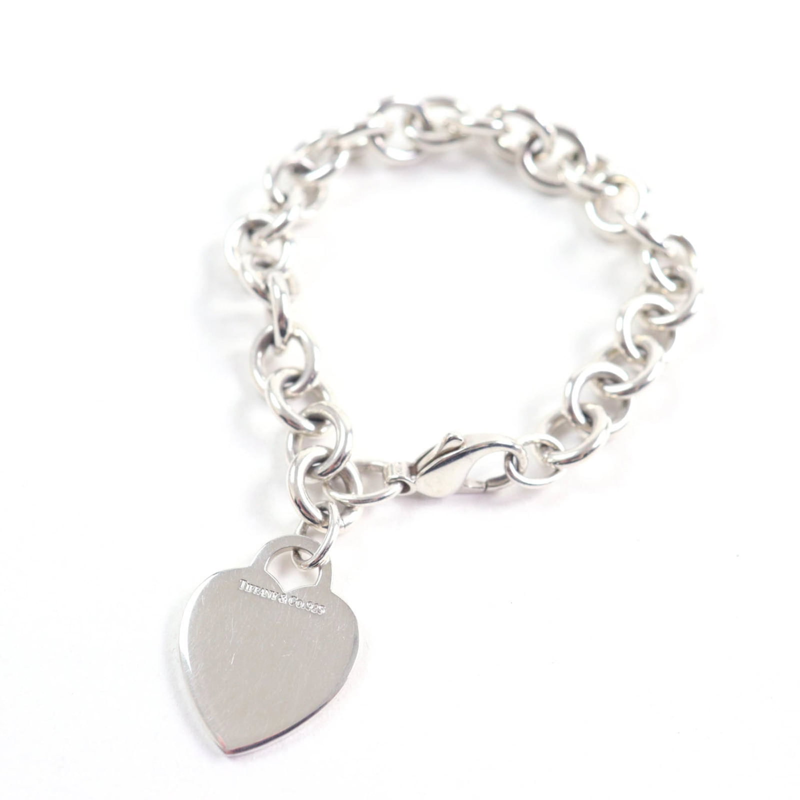 Tiffany Charm of Bracelet: Tiffany Charm of Bracelet Silver Tiffany Charm Bracelet, measuring 19cm in length and weighing 34.5g, features a silver925 metal construction with some scratches and dirt visible due to usage. The