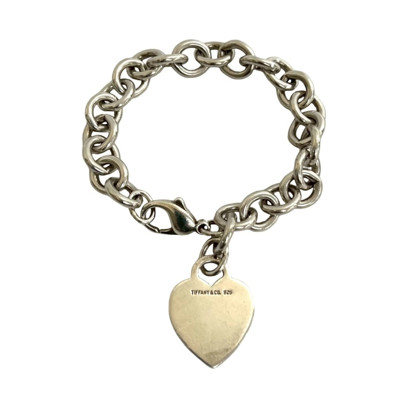 Charm Tiffany Bracelet 925 Silver: Charm Tiffany Bracelet 925 Silver Charm Tiffany Bracelet 925 Silver - A sterling silver charm bracelet with a touch of elegance, measuring 19cm in length. The bracelet features a silver finish and