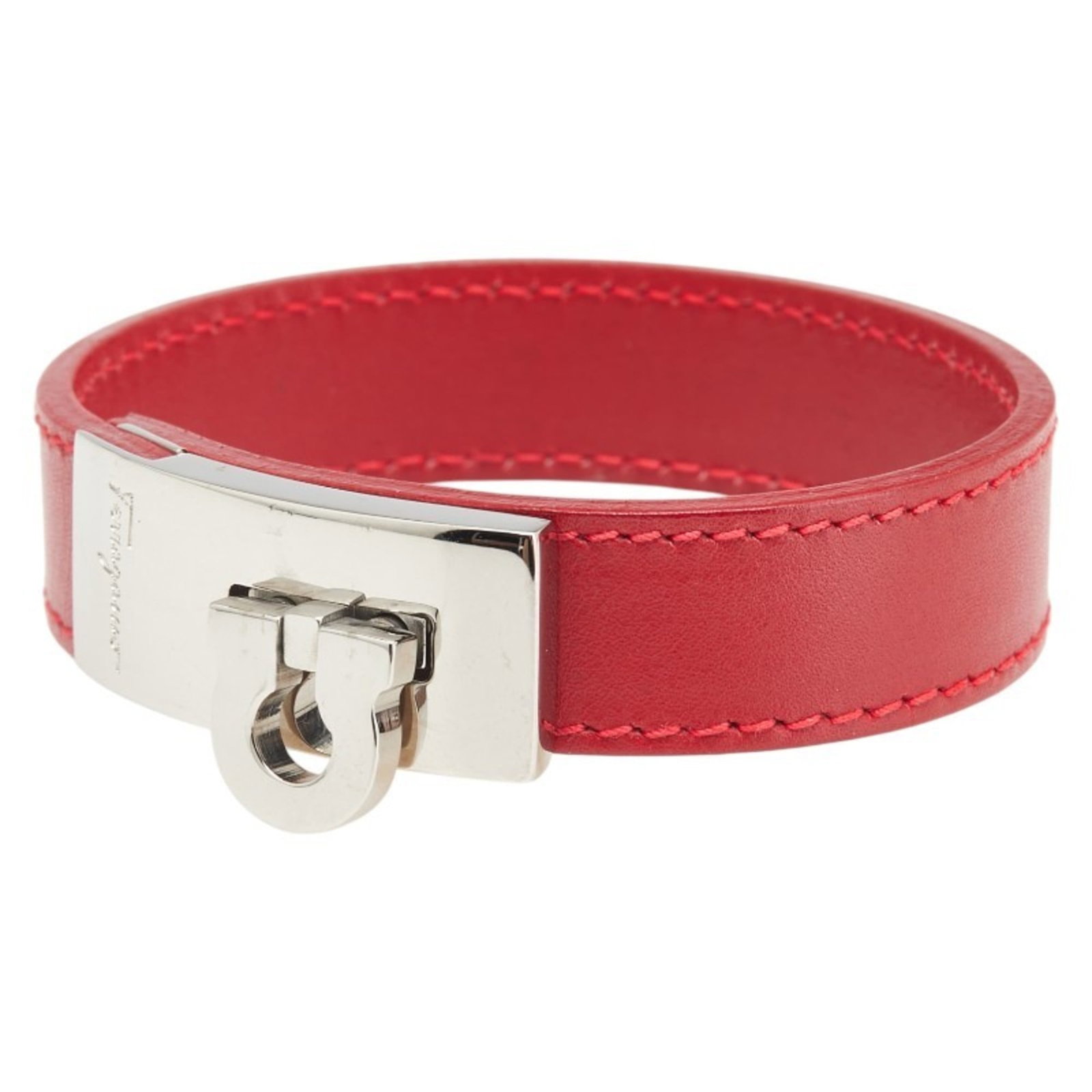 Ferragamo Salvatore Charm Metal Leather Bracelet: Ferragamo Salvatore Charm Metal Leather Bracelet Red leather and silver metal come together in Salvatore Ferragamo's iconic charm bracelet, featuring a bold red hue. The 16cm length provides a versati