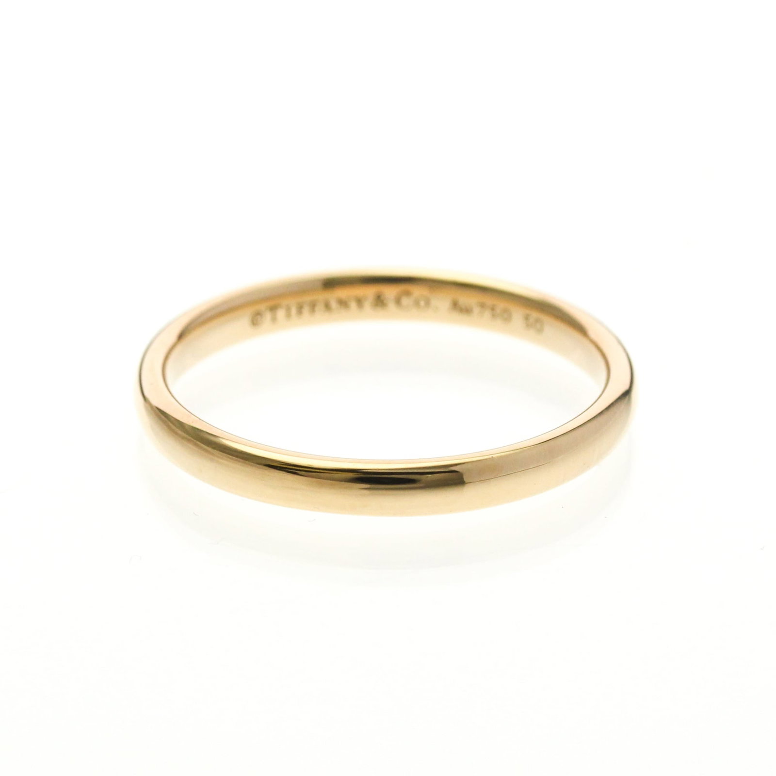 Pink Gold Ring Band Tiffany: Pink Gold Ring Band Tiffany Pink Gold Ring Band from Tiffany, crafted in 18K gold with a slender 2.4mm width and weighing 2.7g. This fashion band features a subtle pink hue, adding a touch of