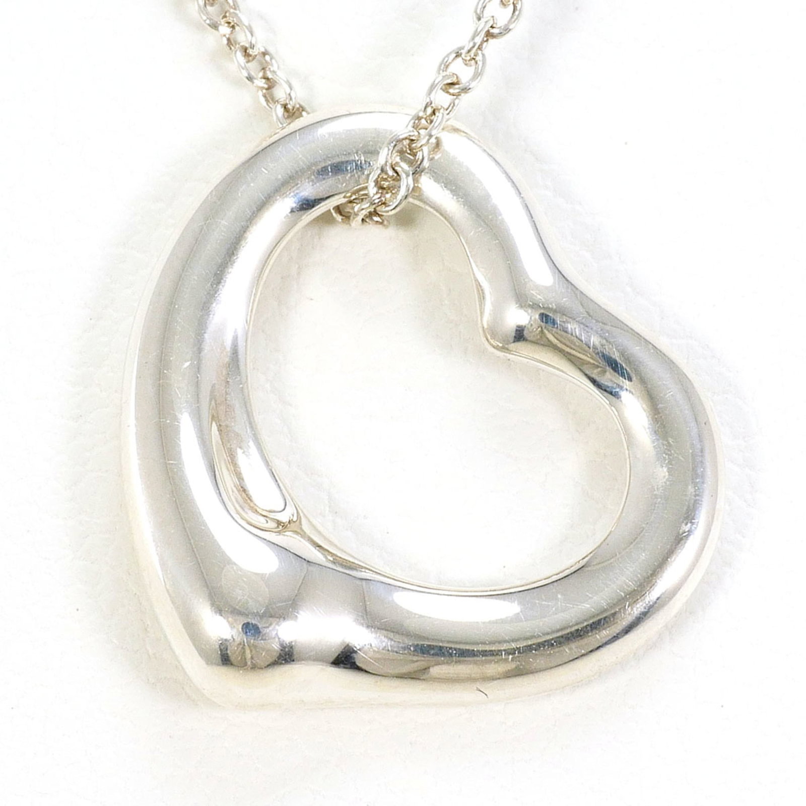 Tiffany & Co. Open Heart Sterling Silver Necklace Approx. 16.5 Inches (41Cm) Total Weight: 3.3G.: Tiffany & Co. Open Heart Sterling Silver Necklace Approx. 16.5 Inches (41Cm) Total Weight: 3.3G. Sterling silver necklace with an open heart pendant, measuring 14mm x 16mm. The necklace features a