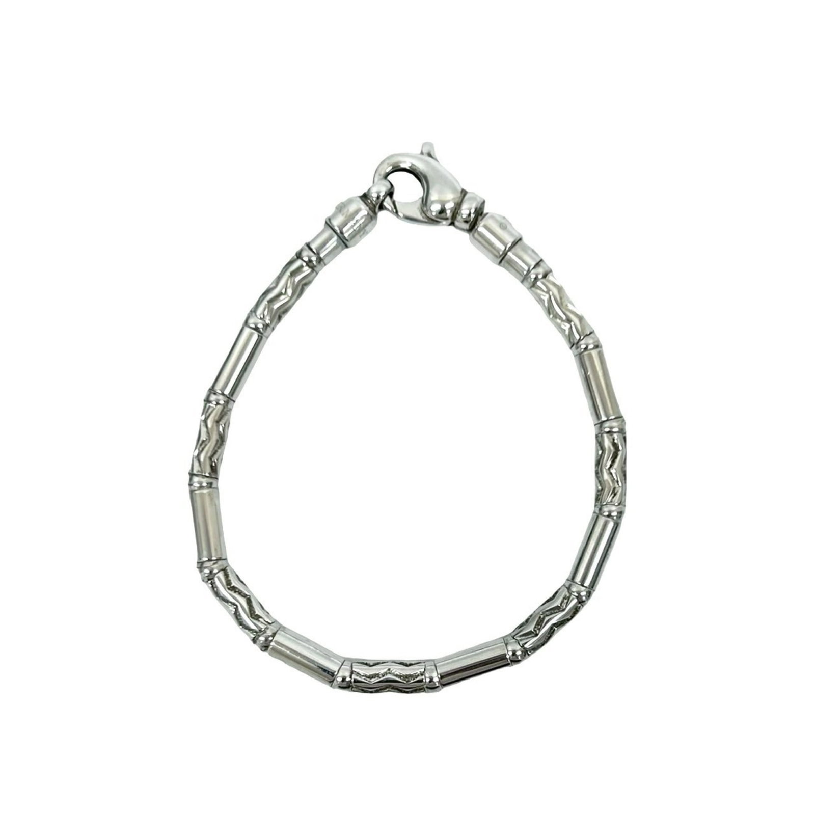 Charm Tiffany Bracelet 925 Silver: Charm Tiffany Bracelet 925 Silver Silver charm bracelet from Tiffany, featuring a classic design with a silver finish. The 19.5cm length provides a comfortable fit for everyday wear. With some signs o