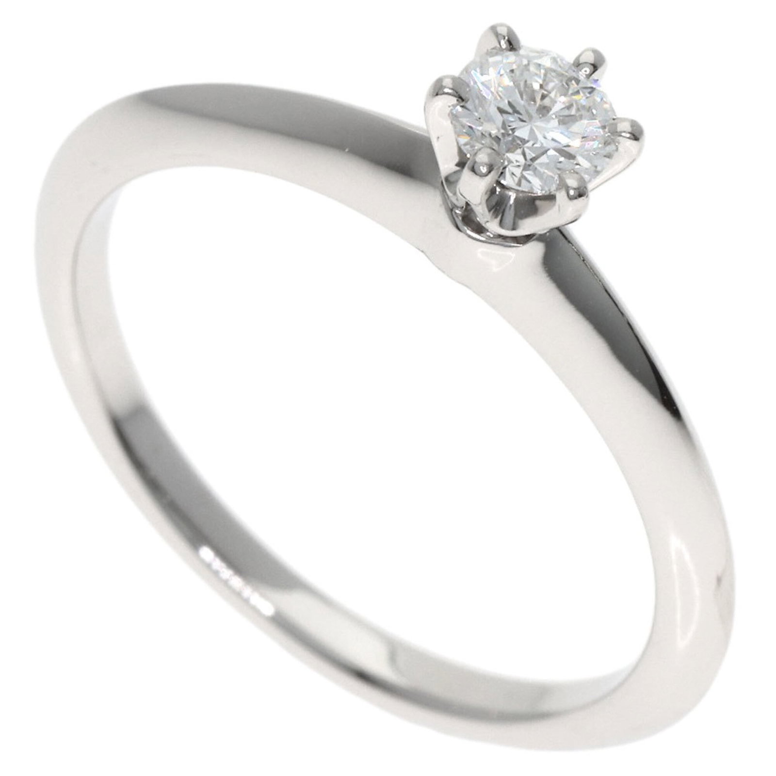 Tiffany Band Ring: Tiffany Band Ring Platinum band ring from Tiffany featuring a 0.23 carat diamond, available in women's size 6 and weighing 3.8g. This used ring bears some scratches and dirt but remains in very good c