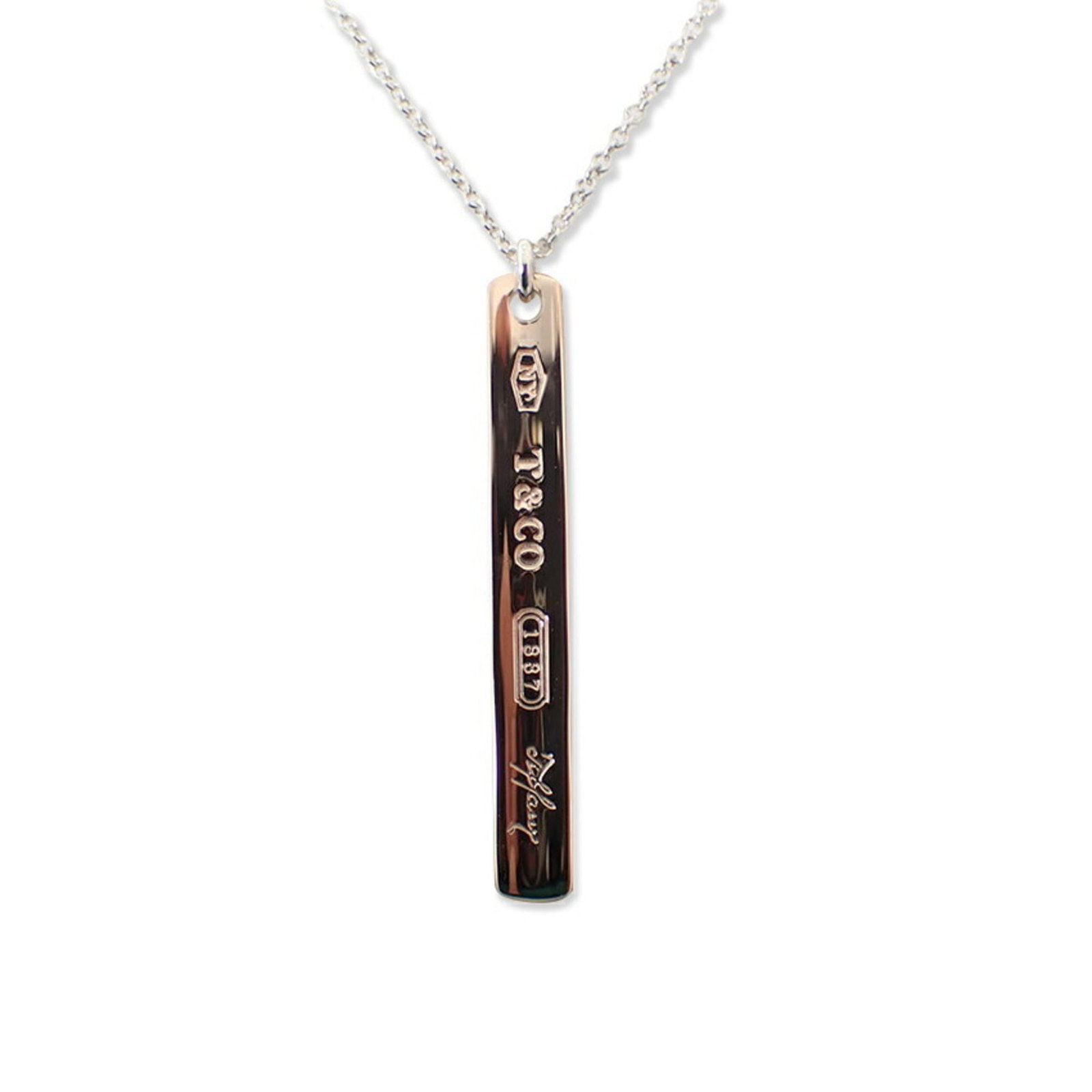 925 Metal 1837 Pendant Tiffany Necklace: 925 Metal 1837 Pendant Tiffany Necklace The 1837 Pendant Tiffany Necklace features a stunning 925 metal design with intricate details, showcasing the classic style of the iconic brand. Made from