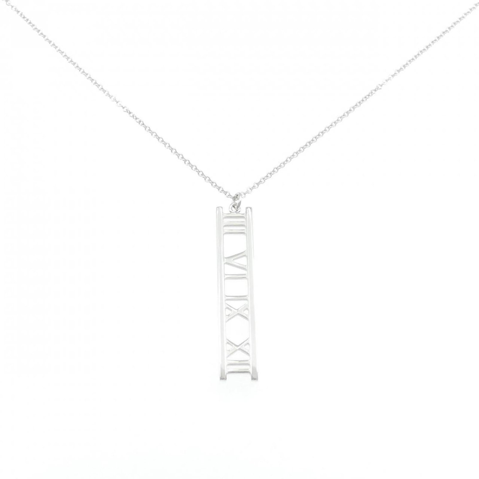 Tiffany & Co. Atlas Open Bar Necklace: Tiffany & Co. Atlas Open Bar Necklace Tiffany & Co. Atlas Open Bar Necklace in White Gold, featuring a striking pendant with intricate details, measures 32.8mm x 6.2mm and sits comfortably on a 41cm w