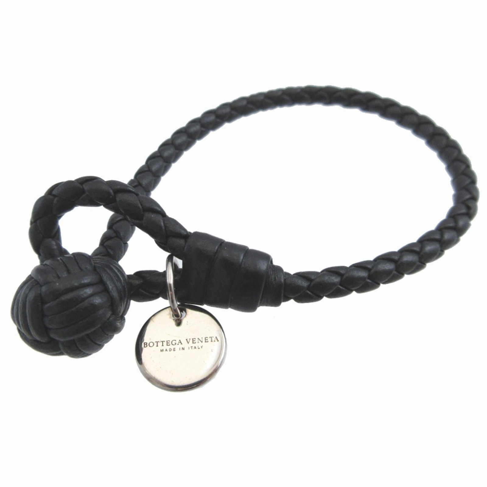 Charm Leather Bracelet Bottega: Charm Leather Bracelet Bottega Black leather charm bracelet from Bottega Veneta, measuring 24cm in length. The bracelet features some scratches and dirt, but remains in very good condition with a few 