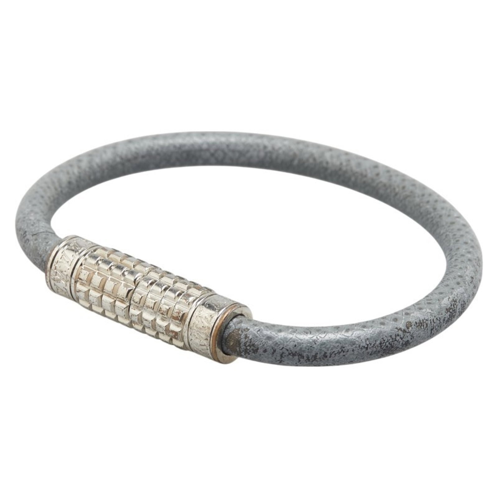 Metal Leather Charm Bracelet By Louis Vuitton: Metal Leather Charm Bracelet By Louis Vuitton Gray metal and leather charm bracelet from Louis Vuitton, featuring a subtle gray color and a classic design. The 17cm length and 5mm width make it a