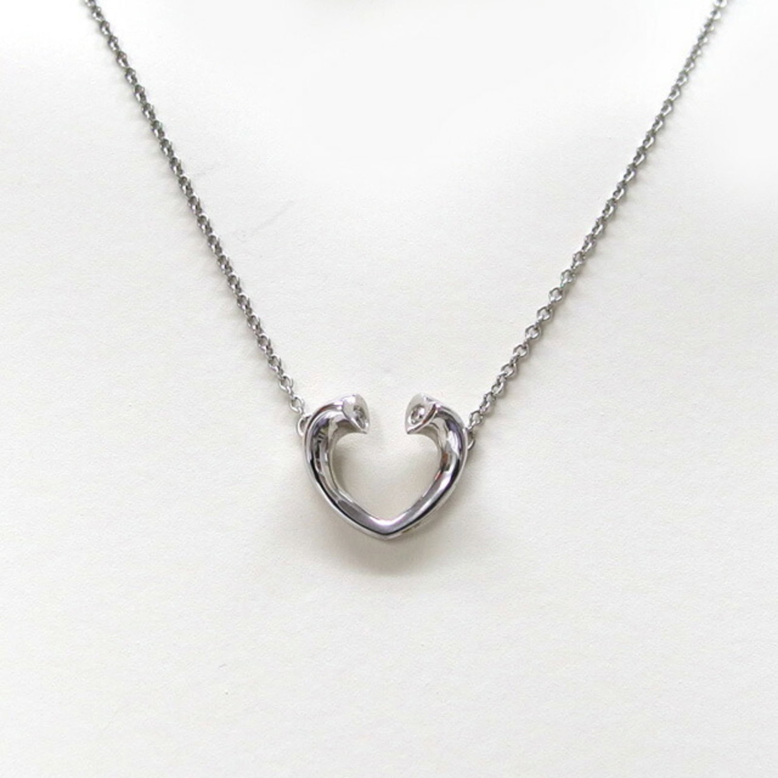 Tiffany Tenderness Heart Diamond Necklace K18Wg: Tiffany Tenderness Heart Diamond Necklace K18Wg Tiffany's Tenderness Heart Diamond Necklace shines with elegance, featuring a stunning 2.6g diamond pendant set in 18K white gold. The necklace boasts a