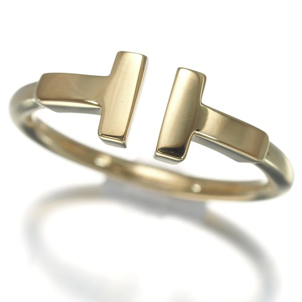 Tiffany&Co. Ring Tiffany T Wire Us5-5.25 18K 750 Yellow Gold: Tiffany&Co. Ring Tiffany T Wire Us5-5.25 18K 750 Yellow Gold Tiffany & Co.'s iconic yellow gold ring showcases the signature Tiffany T Wire design, a hallmark of the brand's craftsmanship. Crafted fro