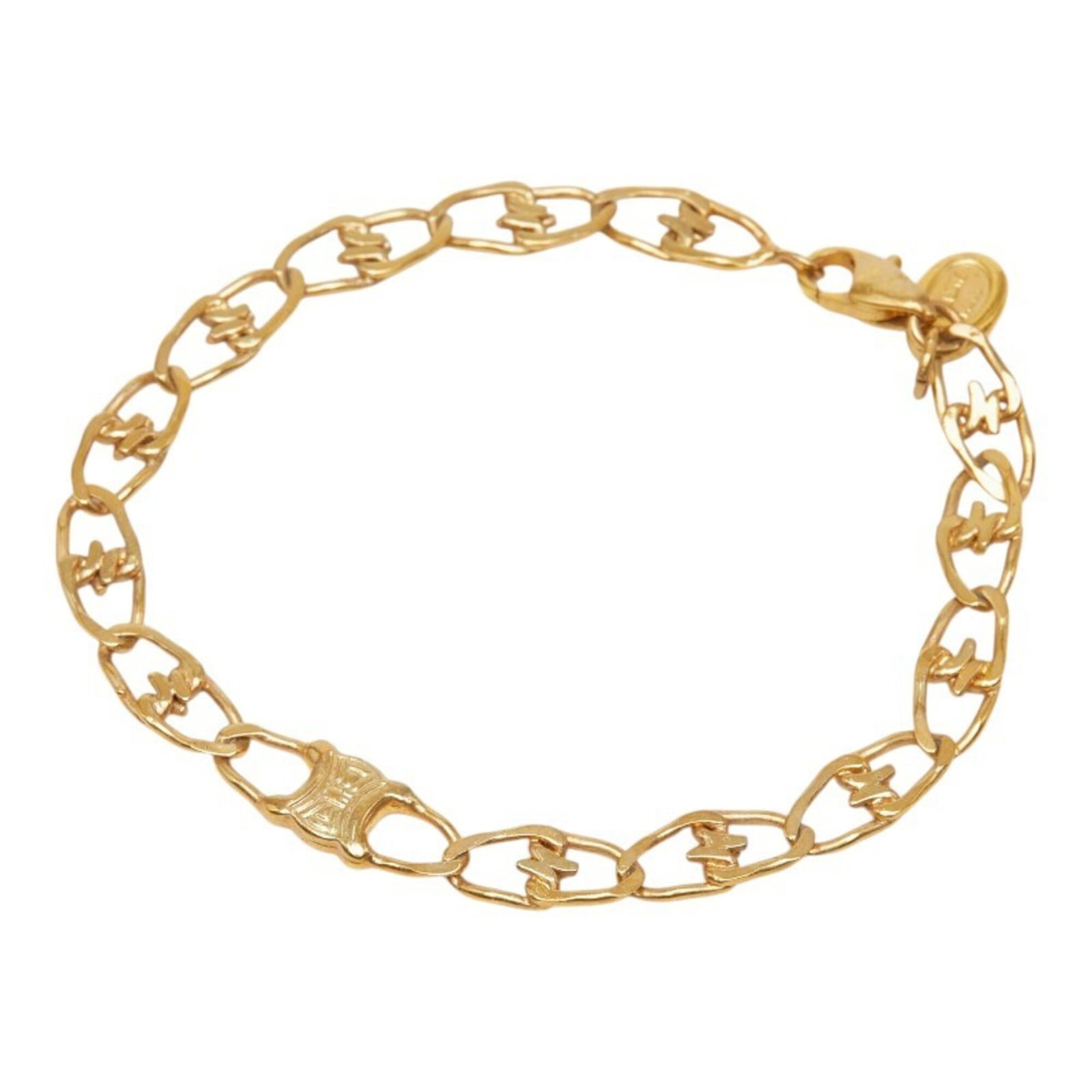 Celine Charm Bracelet: Celine Charm Bracelet Gold charm bracelet with a classic design, measuring 19.5cm in length, bearing traces of usage and minor scratches. The Celine brand adds a touch of sophistication to any