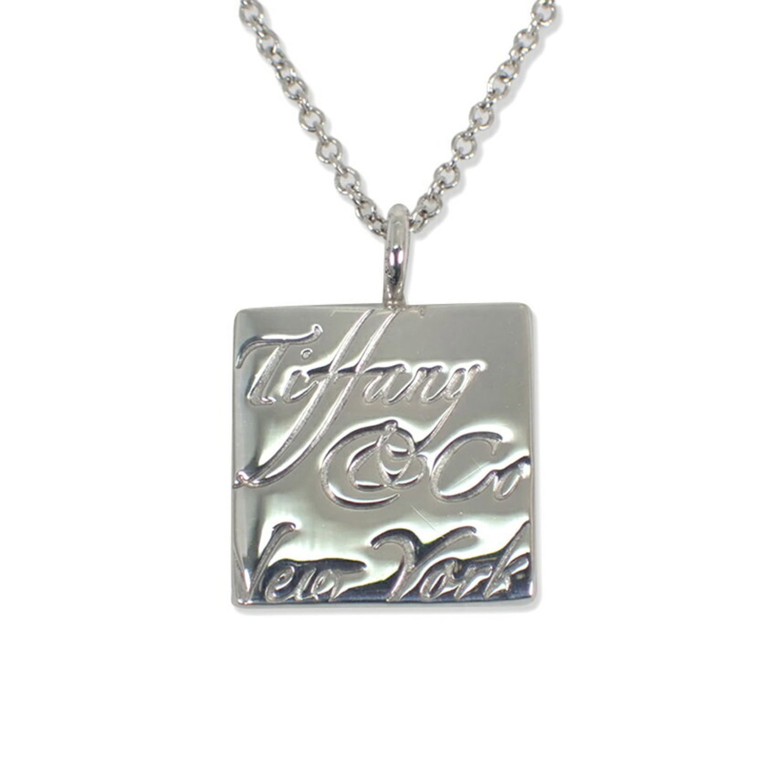 Tiffany & Co. 925 Notes Square Pendant Necklace: Tiffany & Co. 925 Notes Square Pendant Necklace Sterling silver pendant necklace with a 925 Notes Square design from Tiffany & Co. Features a 16.9mm x 12.5mm square pendant, suspended from a chain wit