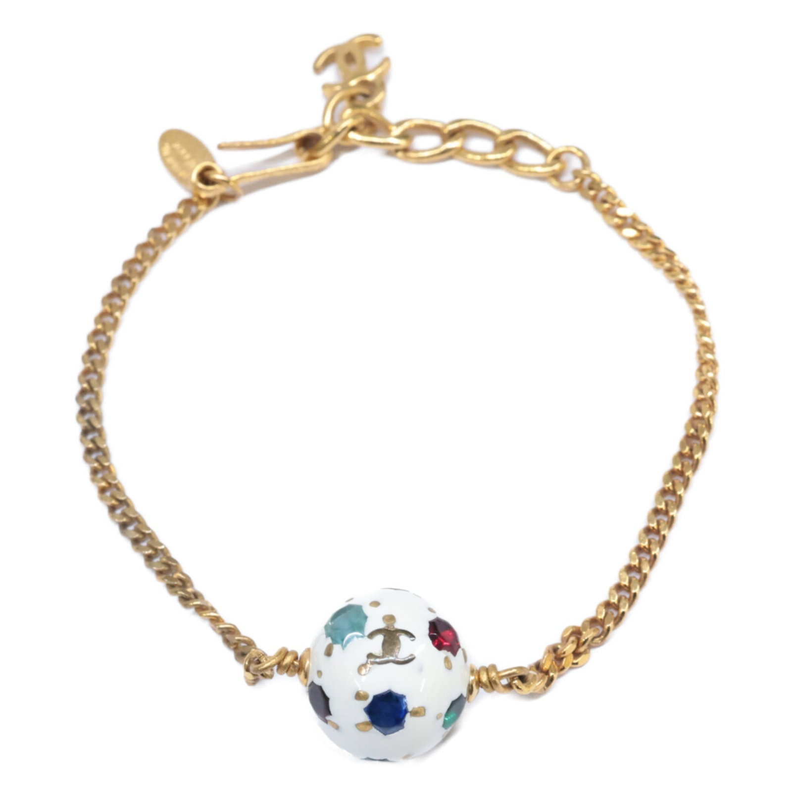 Charm of Chanel: Charm of Chanel Charm of Chanel features a gold and white design, measuring 19.5cm in length. The charm bracelet has some traces of usage, with minor scratches and dirt visible, but remains in very