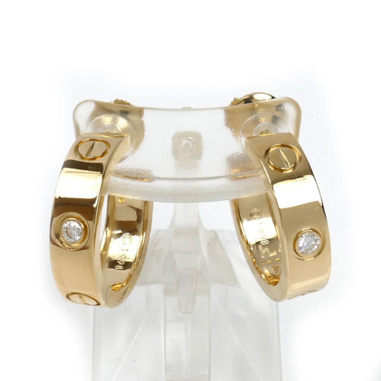 Cartier Stud Earrings Yellow Gold (18K): Cartier Stud Earrings Yellow Gold (18K) Cartier Stud Earrings in Yellow Gold (18K) showcase understated elegance with their sleek design and refined details. The earrings feature a subtle stud style,