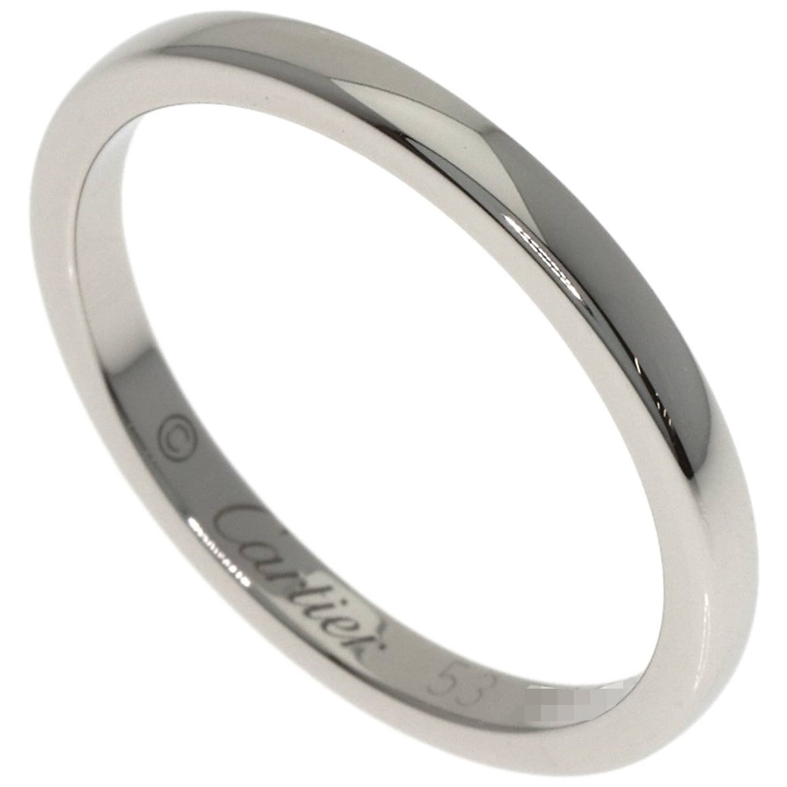 Ring Band by Platinum 950: Ring Band by Platinum 950 Platinum 950 band ring by Cartier, a sophisticated accessory for women. This used ring features a few traces of usage, with some scratches and dirt visible, but remains in