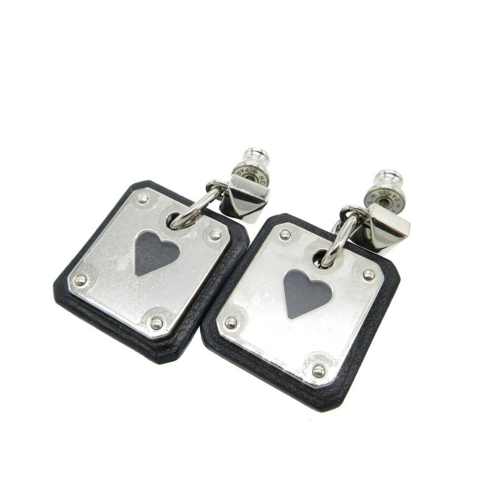 Metal Leather Stud Earrings Hermes: Metal Leather Stud Earrings Hermes Metal Leather Stud Earrings Hermes - Black and Silver. Made from high-quality leather and metal, these stud earrings showcase a sleek black and silver design.