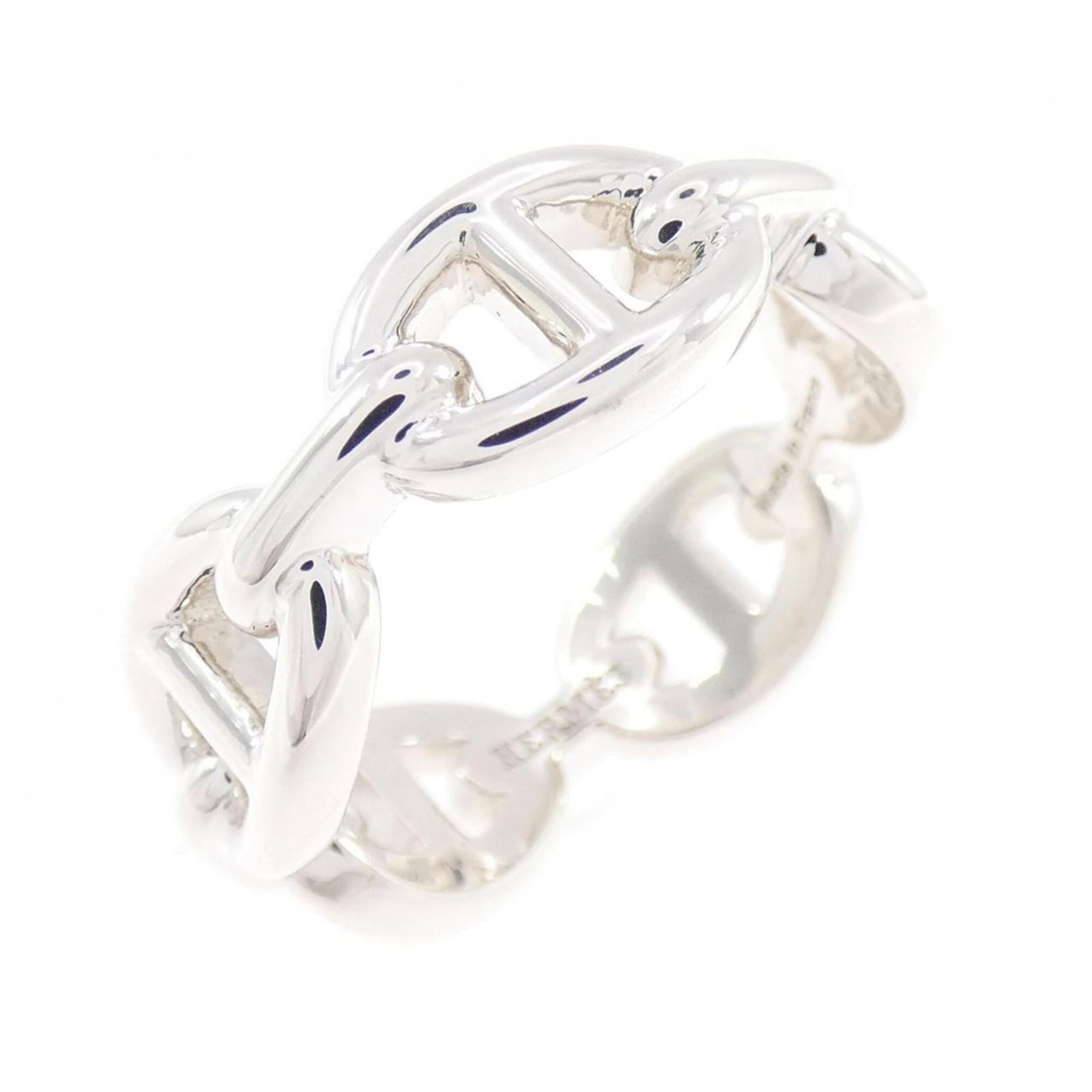 Ring Hermes Silver Band 925: Ring Hermes Silver Band 925 Silver band ring from Hermes, made from high-quality silver (925). This stylish accessory features a sleek design and bears a signature. In excellent condition, with