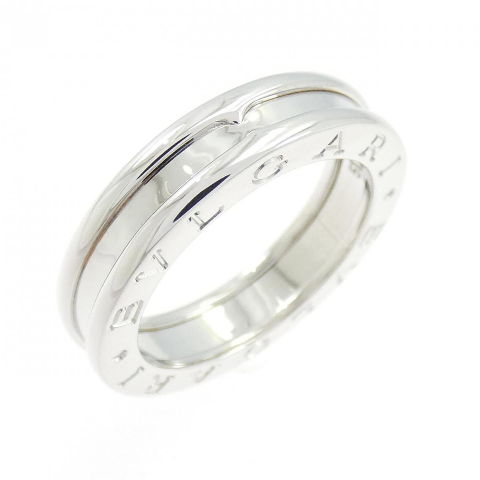 Bvlgari Band Ring White Gold (18K): Bvlgari Band Ring White Gold (18K) Bvlgari Band Ring White Gold (18K) is a refined women's band ring crafted from high-quality white gold. This 51mm size, US Size 6, piece boasts a sleek design with