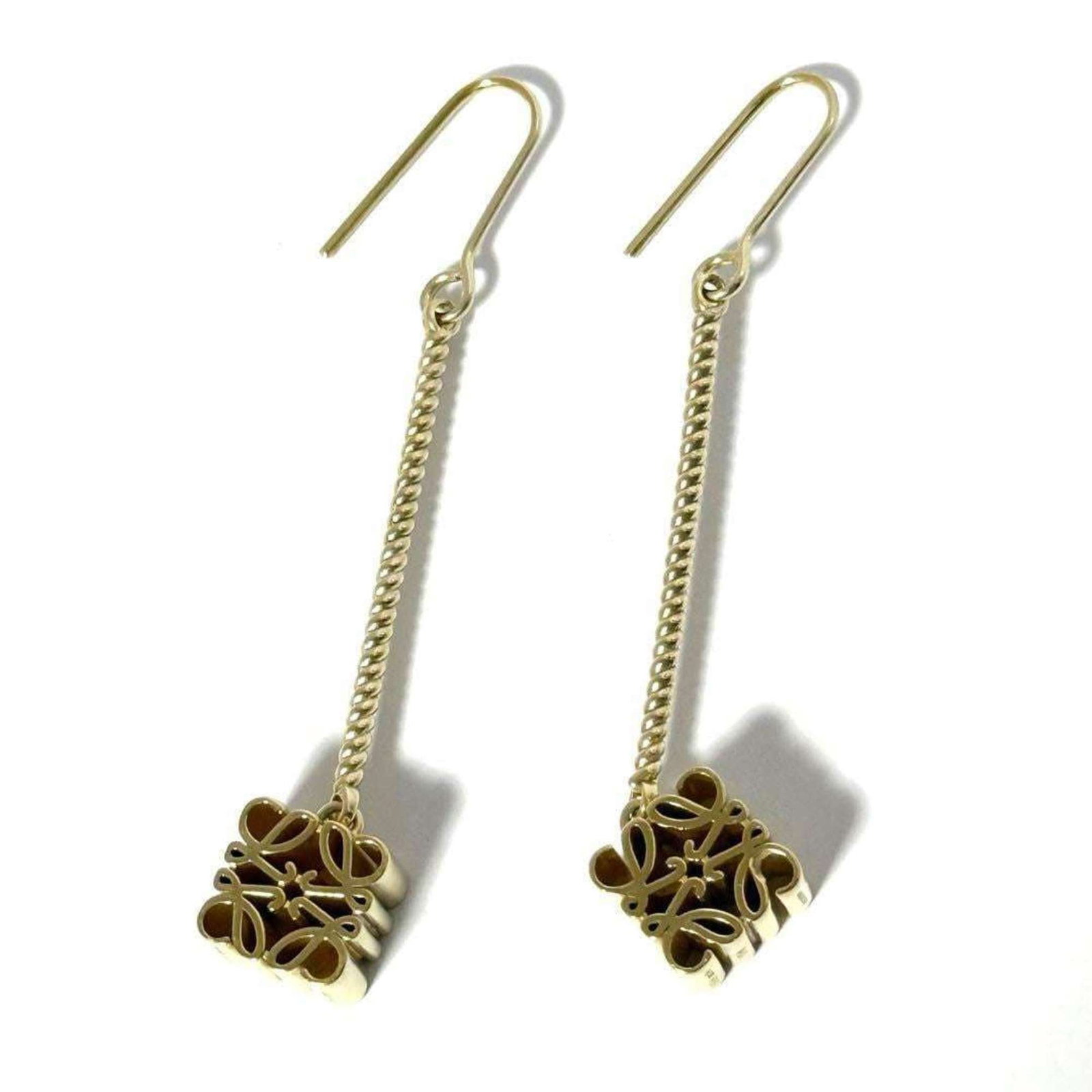 Loewe Drop Earrings Silver 925: Loewe Drop Earrings Silver 925 Silver 925 drop earrings from Loewe, featuring a gold finish and bearing a signature. The earrings are in very good condition, with some minor scratches and dirt present