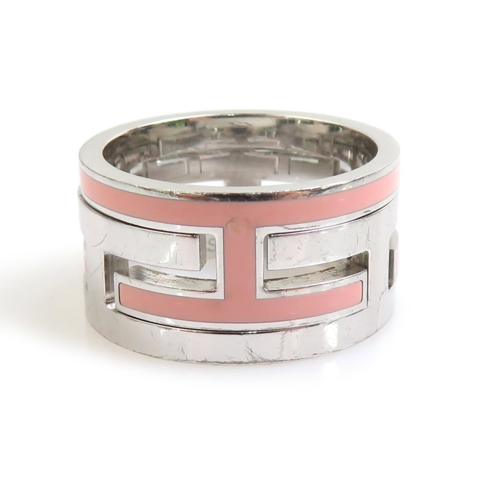 Silver Enamel Ring 925 Band Hermes: Silver Enamel Ring 925 Band Hermes Silver Enamel Ring on 925 Band from Hermes Features a pink enamel design, adding a touch of elegance to any outfit. The ring bears a signature and is made from high-