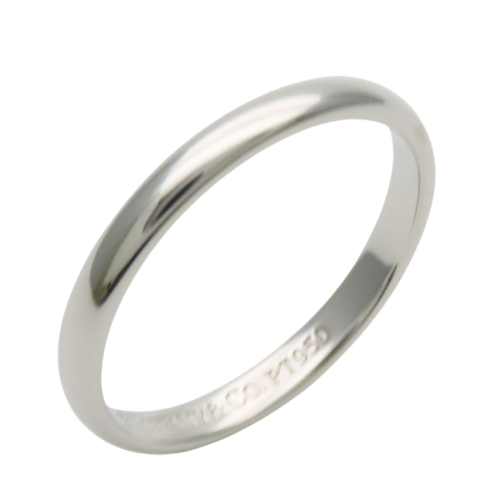 Platinum ring by Tiffany band: Platinum ring by Tiffany band Platinum ring by Tiffany features a band style design made from high-quality platinum material, available in a classic platinum finish. This used item is in like new cond